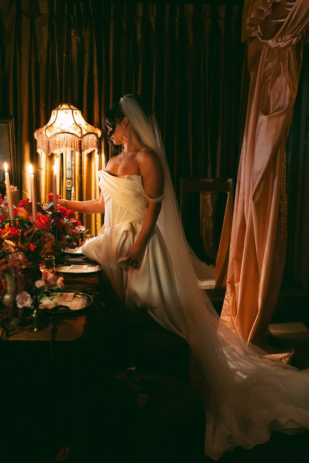 Vintage maximalist more is more wedding inspiration full lush florals pop of red modern corset bridal look le lounge kansas city wedding florist the cottage rose crossroads spring wedding decor brown fabric orchids amaranth bride kc fringe