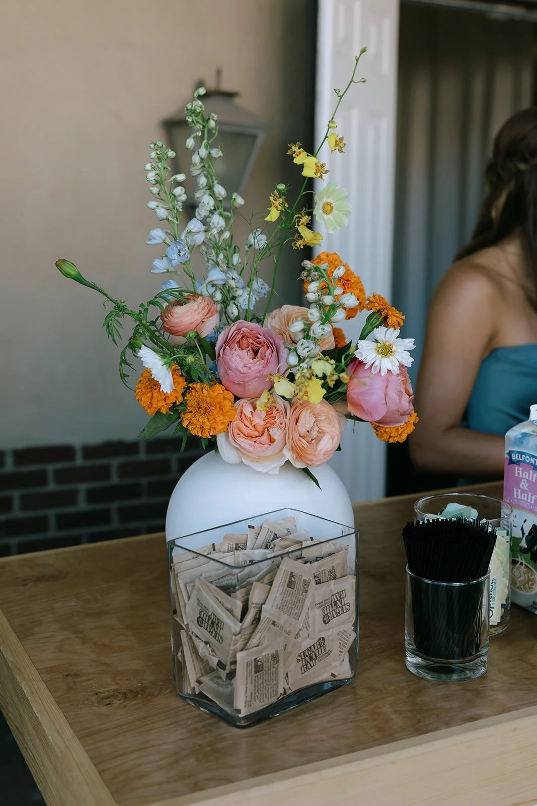 colorful flower filled october wedding in midtown kansas city la villa bridal bouquet wedding bouquet wedding flowers orchids garden roses ranunculus the cottage rose kansas city wedding florist crossroads welcome flower arrangement