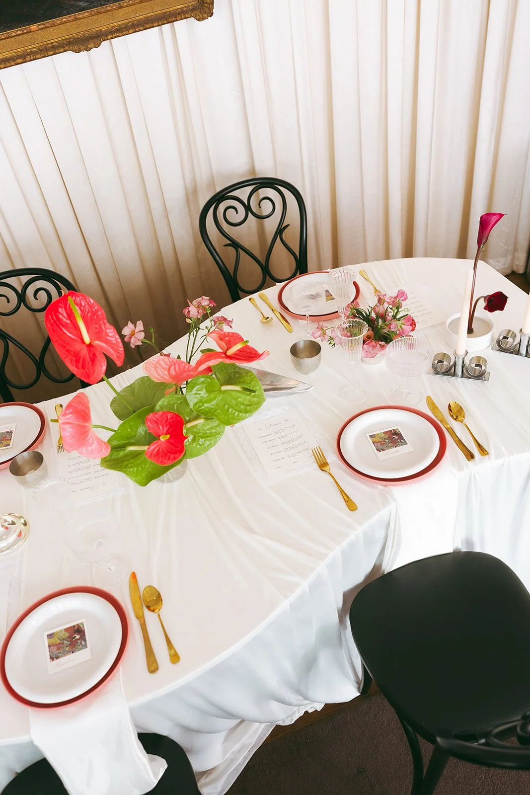 minimal modern feminine whimsical serpentine table centerpiece burgundy and green color palette orchids anthurium amaranth carnation mound the cottage rose kansas city wedding florist crossroads le lounge no vacancy bride kc true love coordination