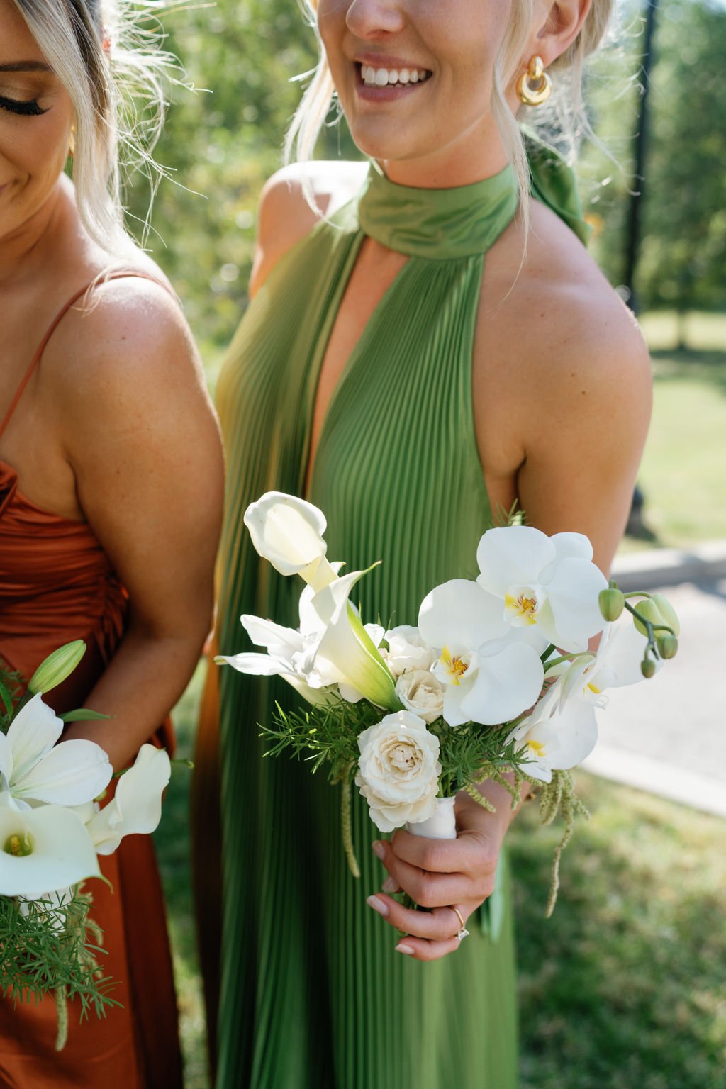 Modern eclectic luxury wedding on the lawn at liberty memorial greenhouse tent wedding outdoor reception fall wedding october the cottage rose kansas city wedding florist crossroads bridesmaids colorful dressed white and green bouquets callas