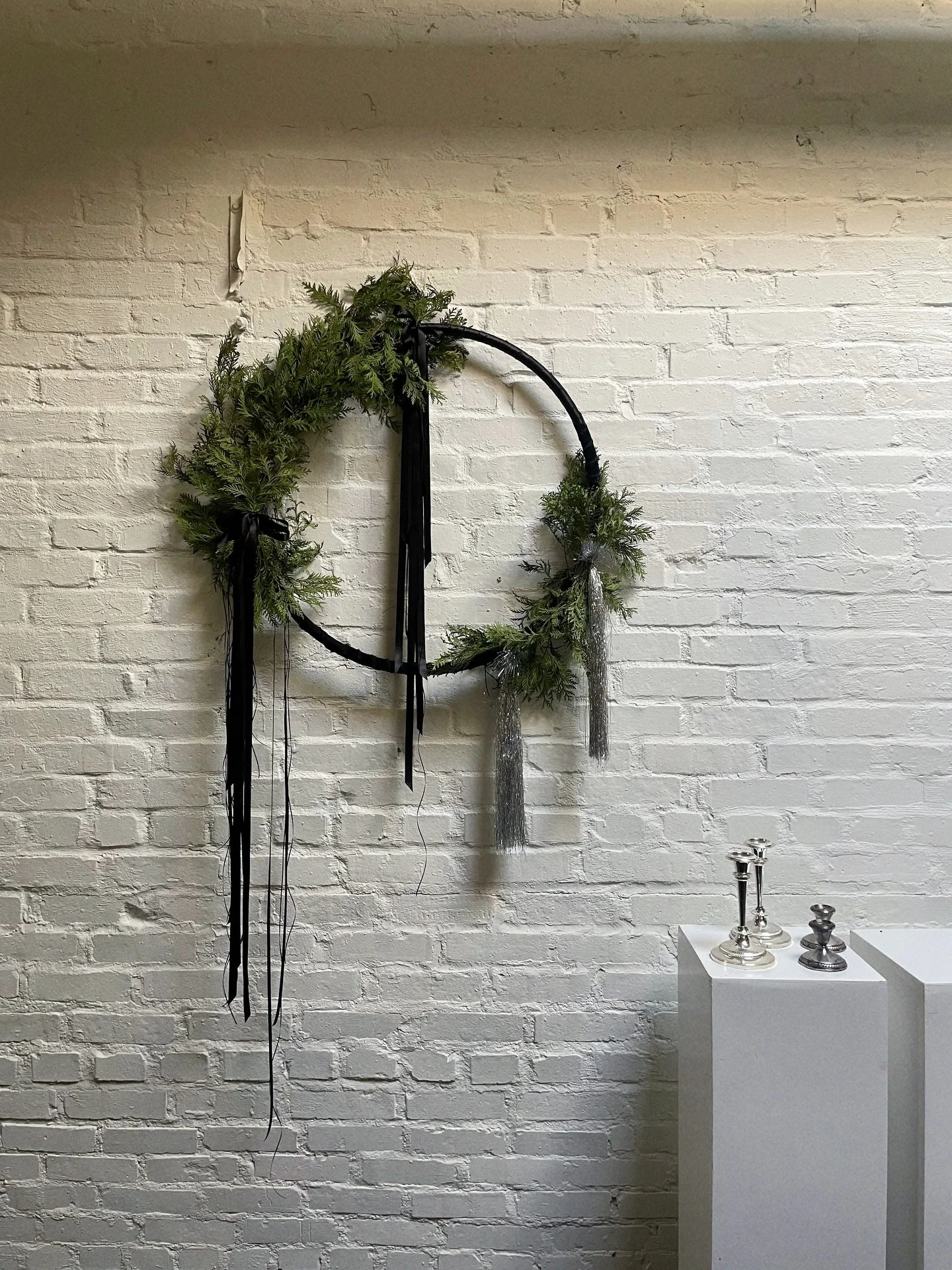 Black ribbons, tinsel and evergreen 🌲 #thecottagerose 
.
.
.
Kansas City florist | modern florals | wreath season | modern wreath