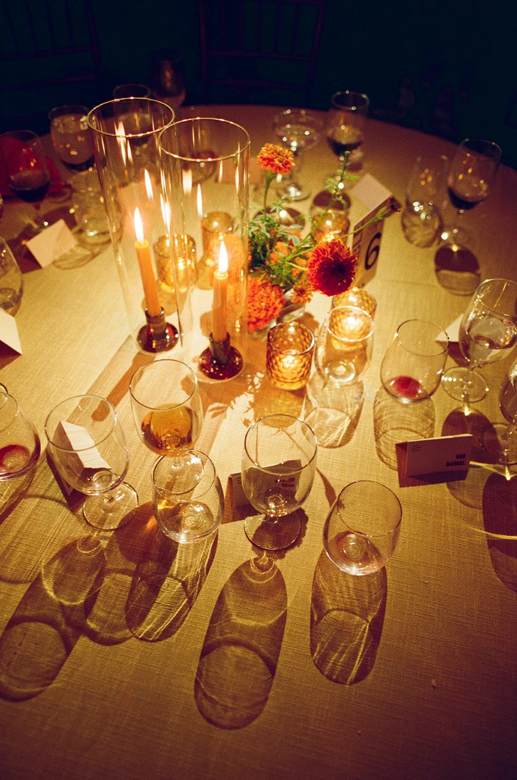 Modern september wedding reception orange and yellow color palette craspedia bud vases centerpieces silver candelabra  the cottage rose kansas city wedding florist crossroads hotel kansas city wedding orange marigold ikebana arrangement centerpiece