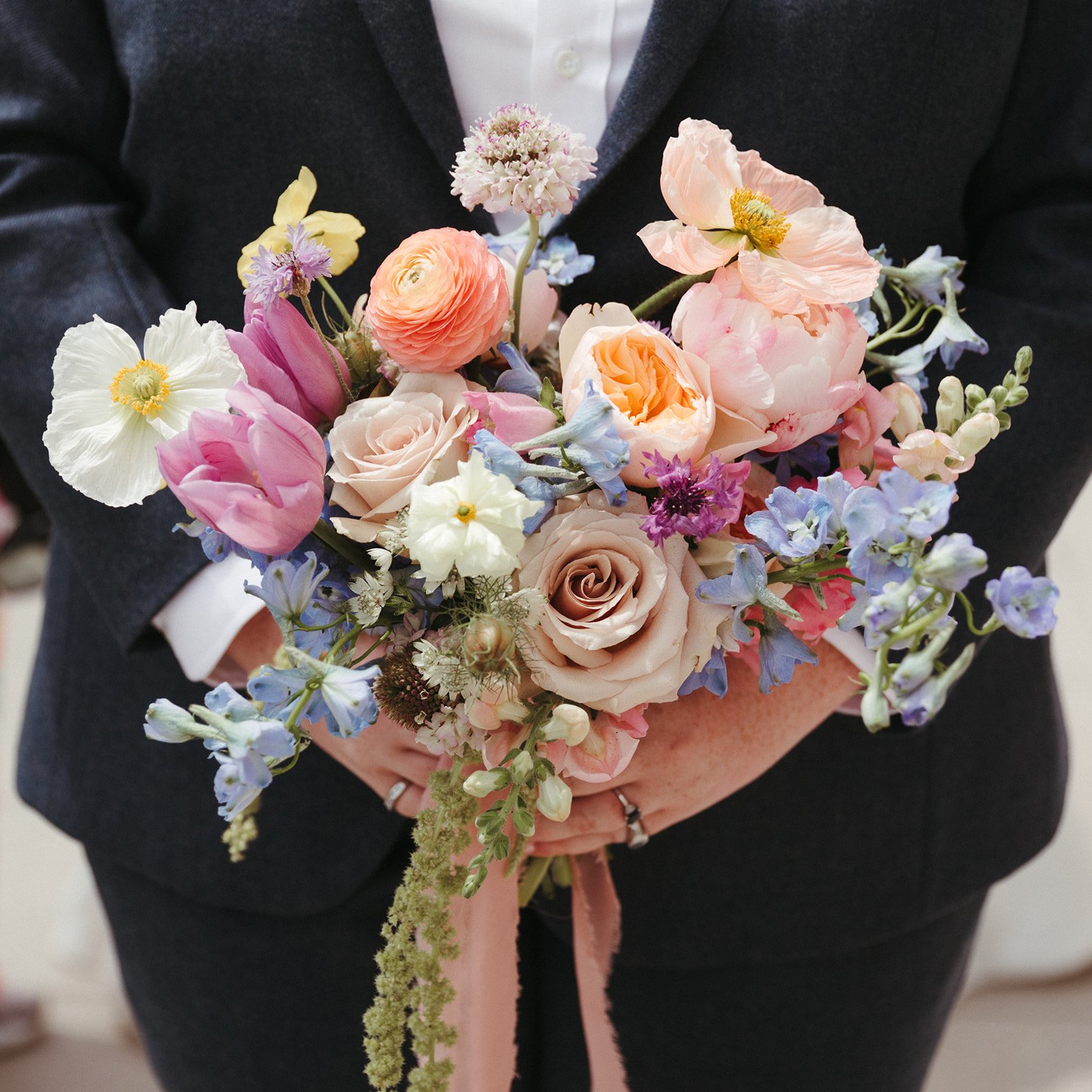 whimiscal spring garden wedding pastel color palette same sex wedding personal flowers bridal bouquets  downtown kc hotel kansas city the cottage rose kansas city wedding florist crossroads bridal portraits