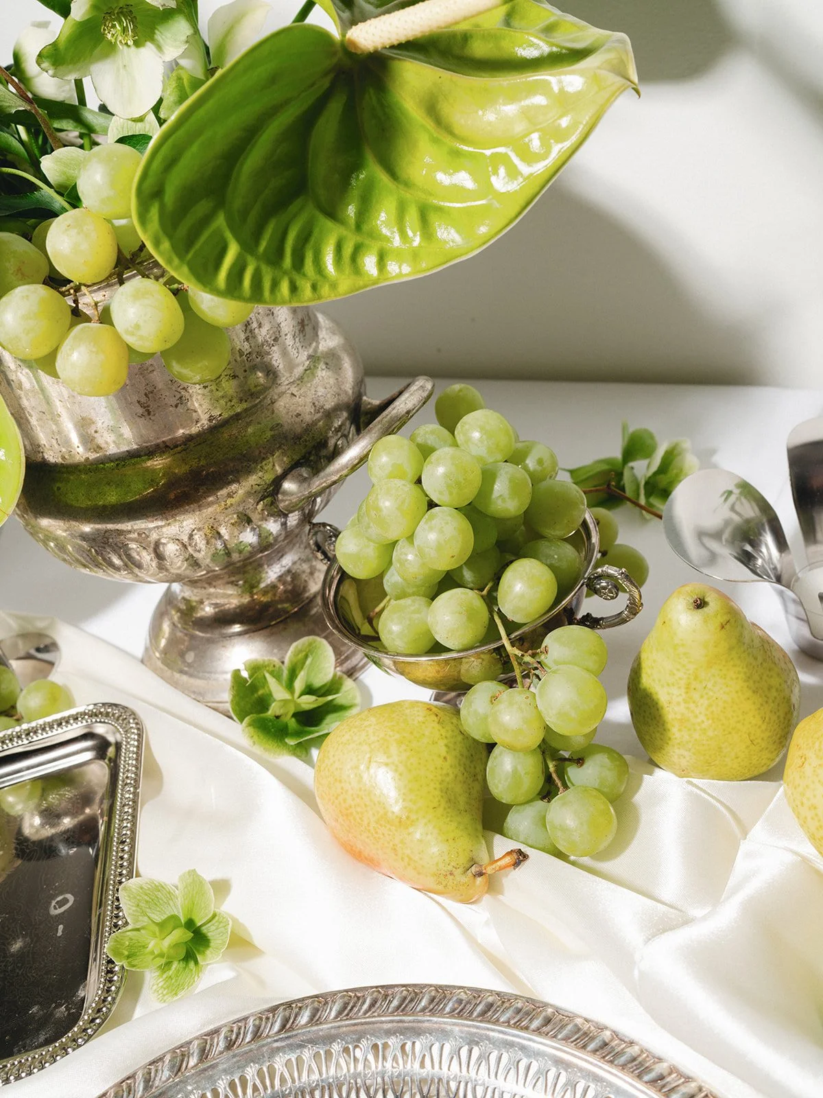 Sculptural modern spring wedding bud vases fruit and flowers candles hanging installation midtown la villa spring flowers the cottage rose kansas city wedding florist crossroads reception decor antique silver chrome