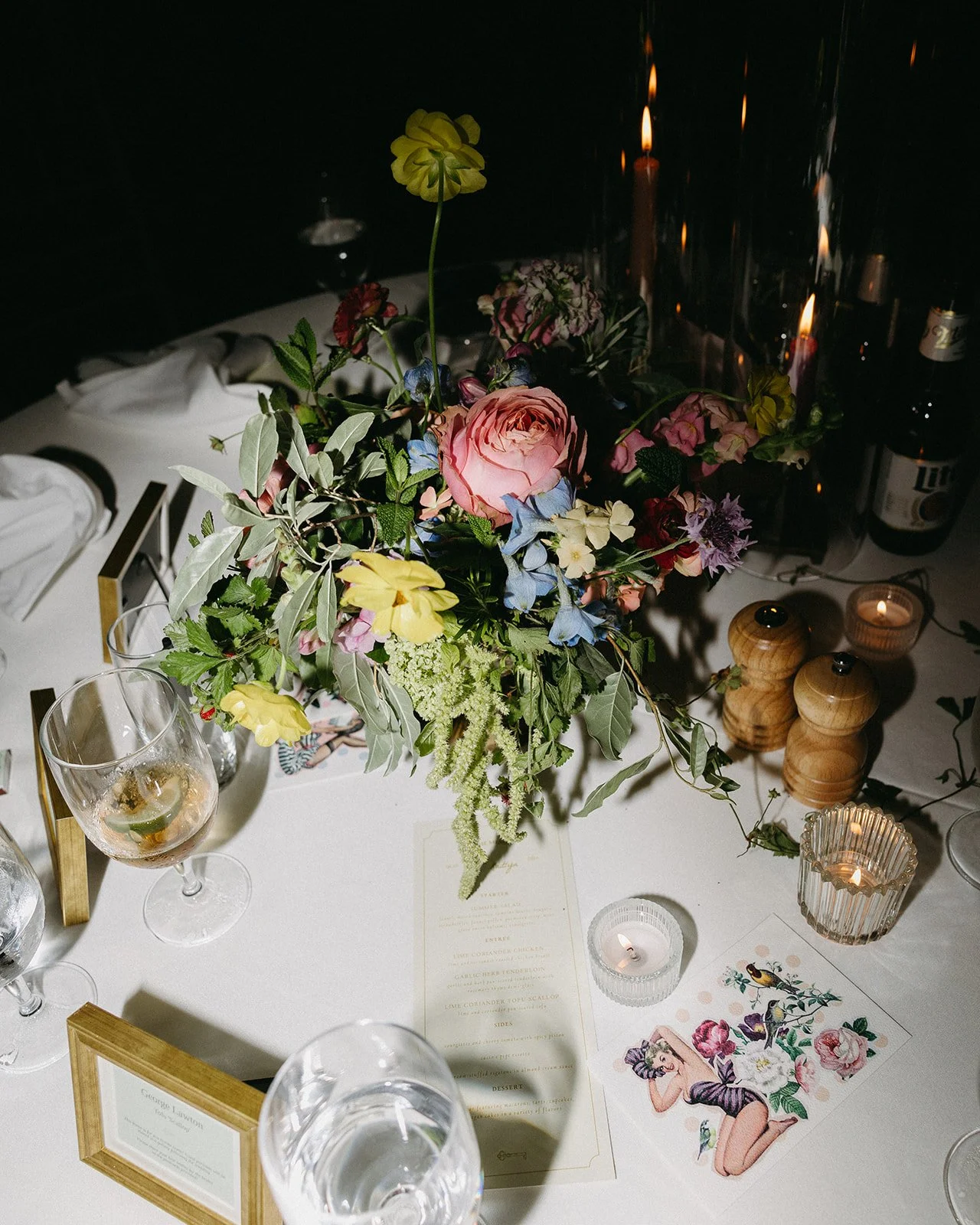 candlelit whimiscal spring garden wedding pastel color palette same sex wedding reception table floral centerpieces downtown kc hotel kansas city the cottage rose kansas city wedding florist crossroads