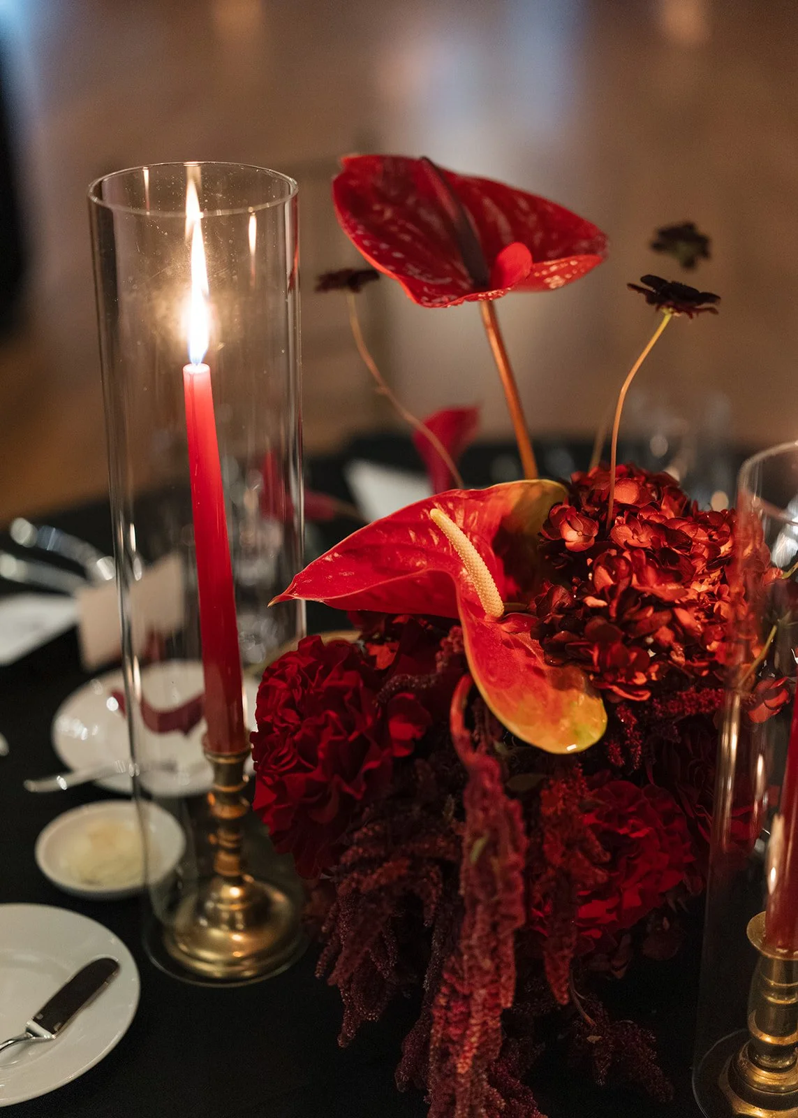 Modern chic november fall wedding downtown hotel kansas city rose calla lilies amaranth reception taper candles red burgundy hydrangea mound centerpiece anthurium the cottage rose kansas city wedding florist crossroads