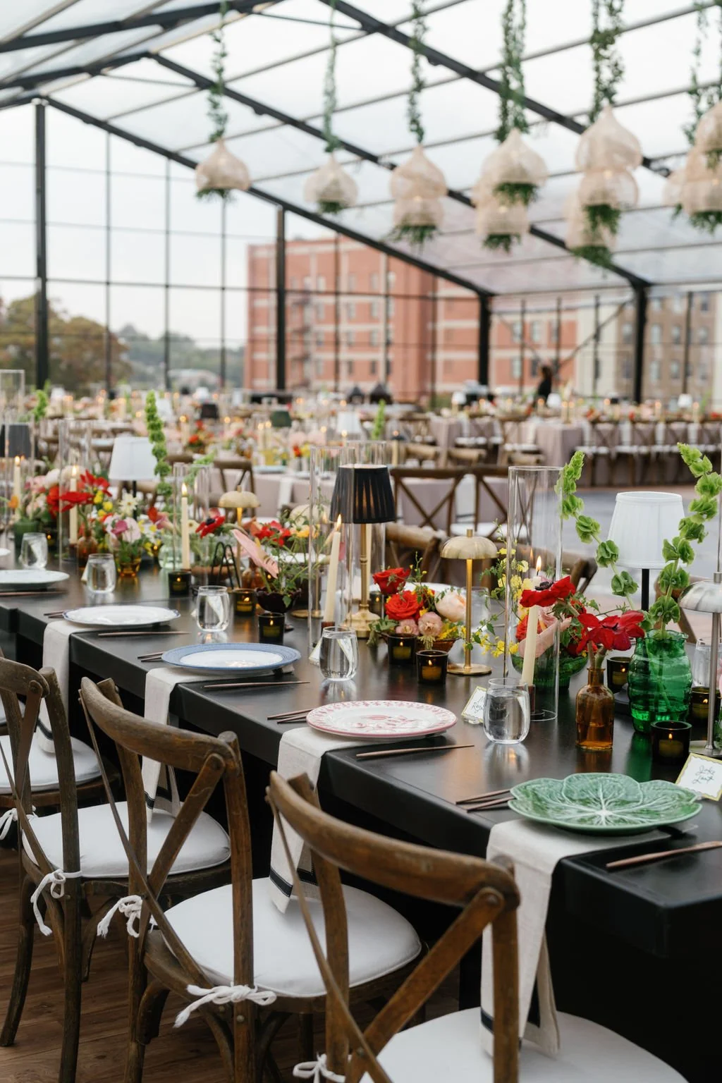 Modern eclectic luxury wedding on the lawn at liberty memorial greenhouse tent wedding outdoor reception fall wedding decor october wedding the cottage rose kansas city wedding florist crossroads centerpieces lamps candles ikebana bud vases