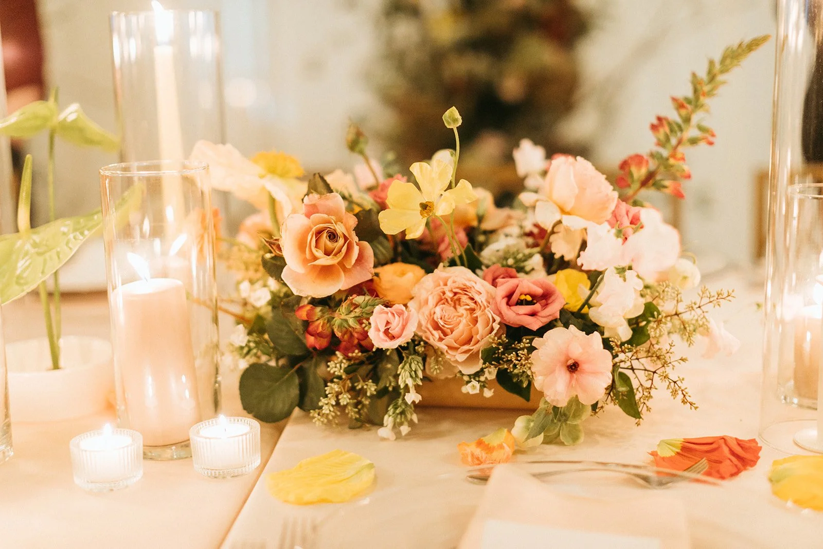 reception flowers large lush floral arch ceremony backdrop head table flowers and candlesmodern garden wedding flowers  the grand hall downtown kc the cottage rose kansas city wedding florist crossroads