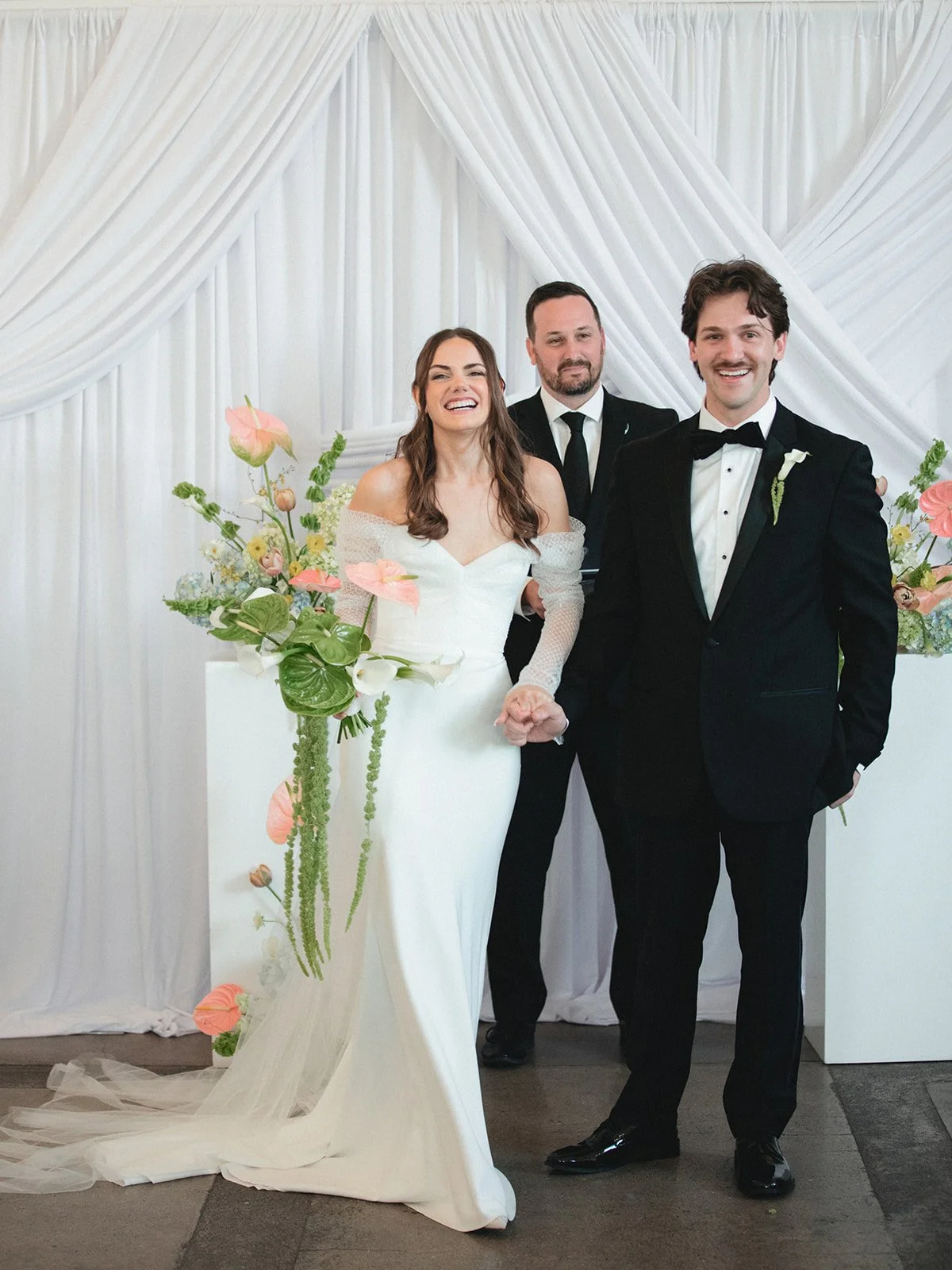 Sculptural modern spring wedding pedestal floral installation anthurium amaranth midtown la villa spring flowers the cottage rose kansas city wedding florist crossroads ceremony decor bride and groom