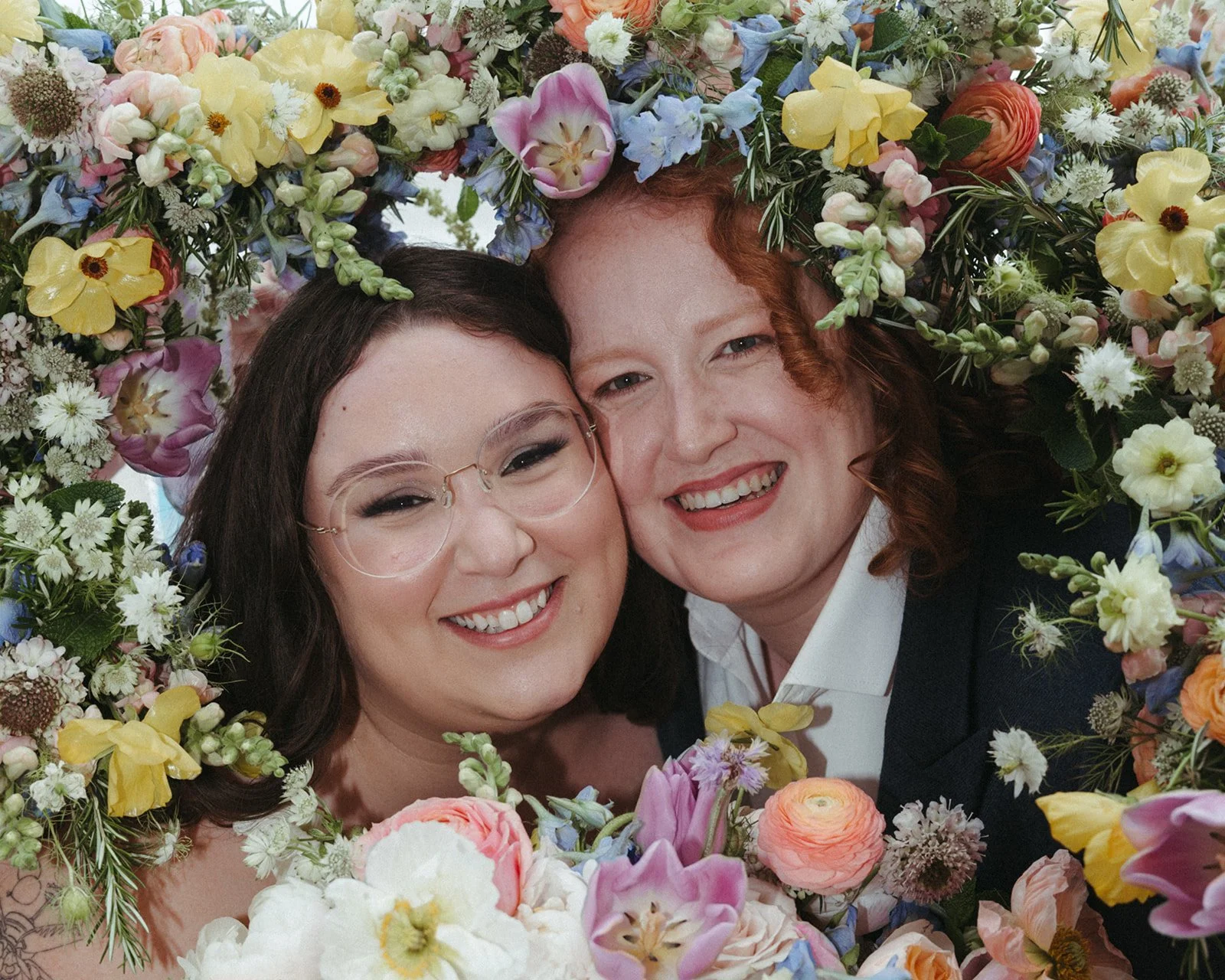 whimiscal spring garden wedding pastel color palette same sex wedding personal flowers bridal bouquets  downtown kc hotel kansas city the cottage rose kansas city wedding florist crossroads bridal portraits