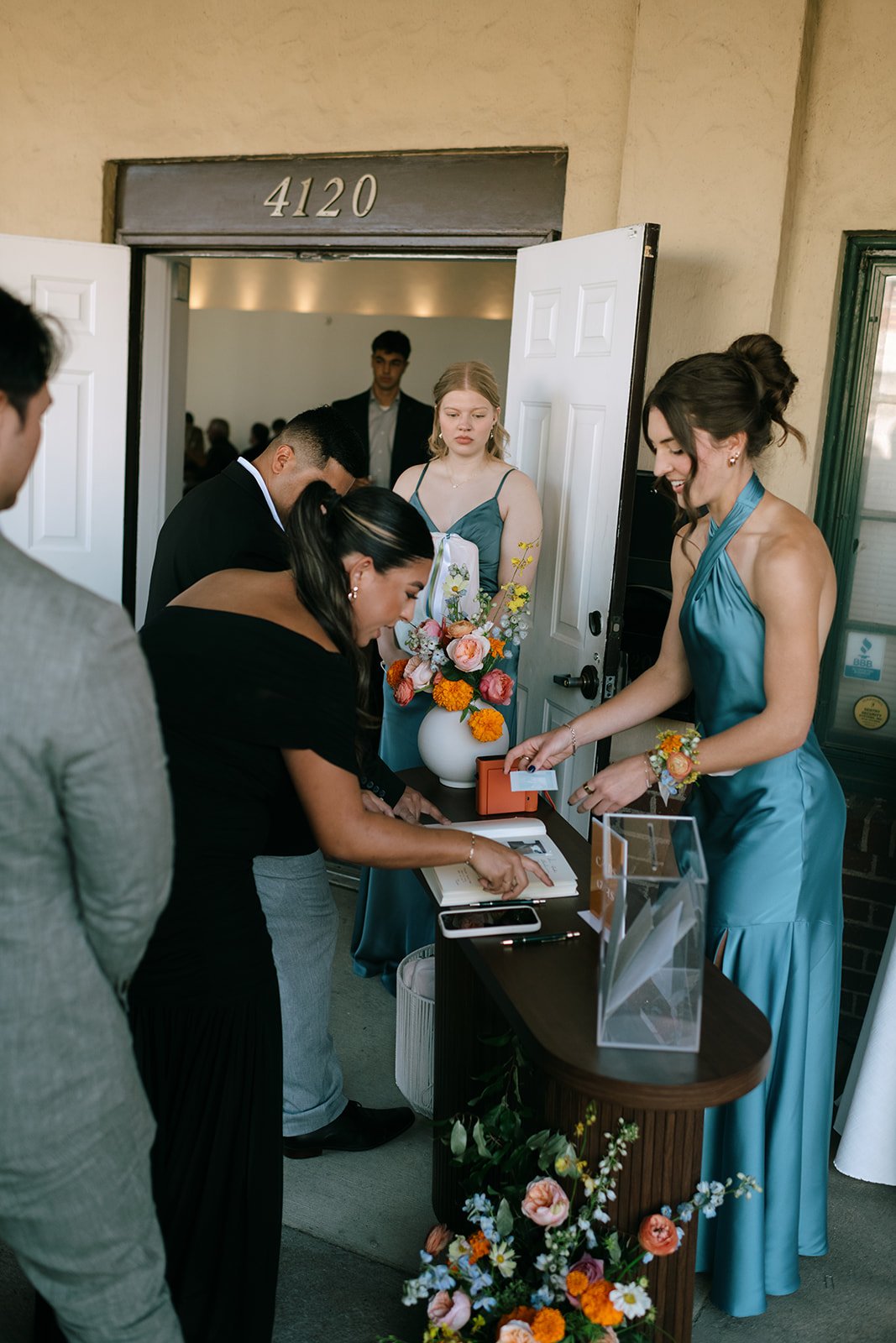 colorful flower filled october wedding in midtown kansas city la villa bridal bouquet wedding bouquet wedding flowers orchids garden roses ranunculus the cottage rose kansas city wedding florist crossroads welcome flower arrangement