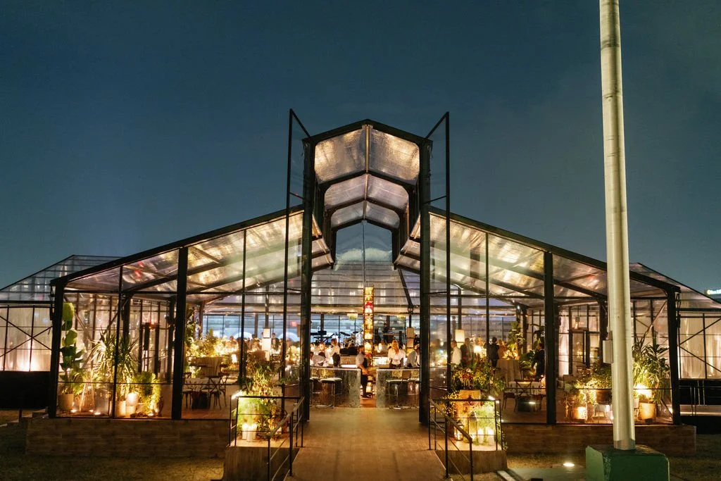 Modern eclectic luxury wedding on the lawn at liberty memorial greenhouse tent wedding outdoor reception fall wedding decor october wedding the cottage rose kansas city wedding florist crossroads bar cocktail entrance