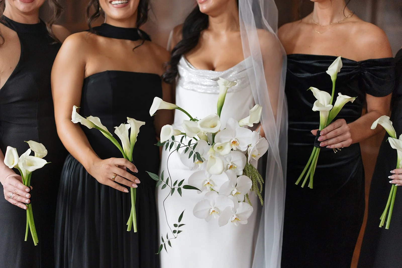 Modern chic november fall wedding downtown hotel kansas city orchids calla lilies amaranth anthurium wedding party the cottage rose kansas city wedding florist crossroads