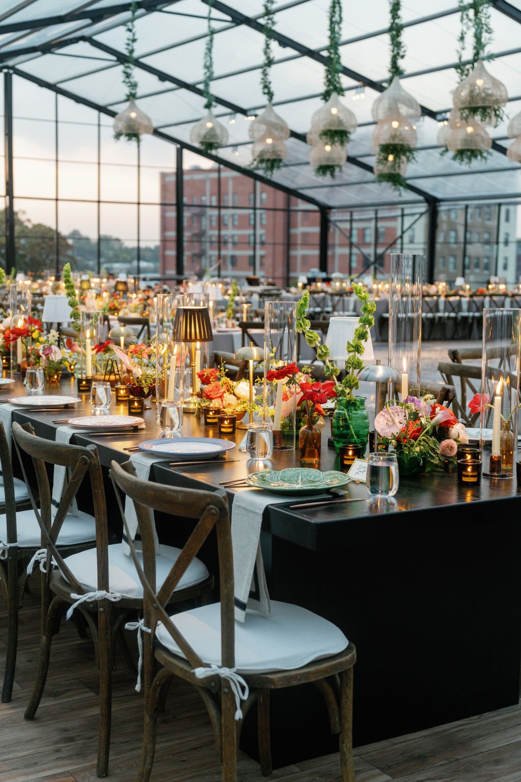 Modern eclectic luxury wedding on the lawn at liberty memorial greenhouse tent wedding outdoor reception fall wedding decor october wedding the cottage rose kansas city wedding florist crossroads centerpieces lamps candles ikebana bud vases