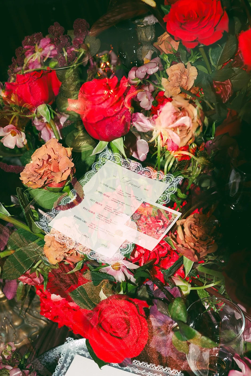 Vintage maximalist more is more wedding inspiration full lush florals pop of red double exposure le lounge kansas city wedding florist the cottage rose crossroads spring wedding decor brown fabric orchids amaranth lace fringe