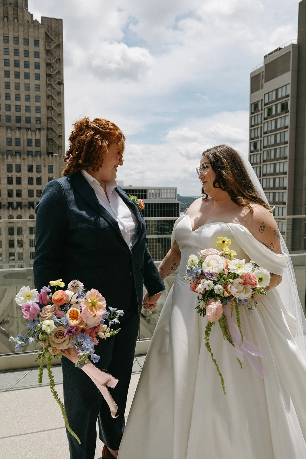 whimiscal spring garden wedding pastel color palette same sex wedding personal flowers bridal bouquets  downtown kc hotel kansas city the cottage rose kansas city wedding florist crossroads bridal portraits