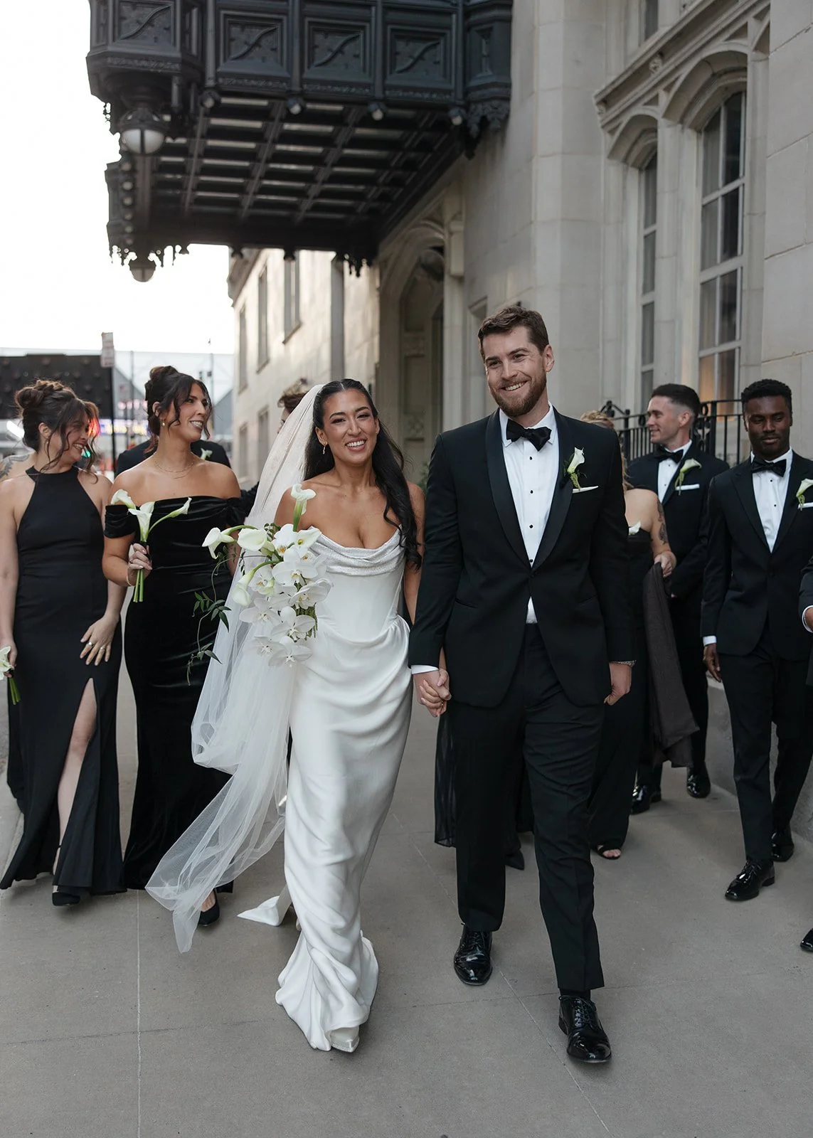 Modern chic november fall wedding downtown hotel kansas city orchids calla lilies amaranth anthurium wedding party the cottage rose kansas city wedding florist crossroads