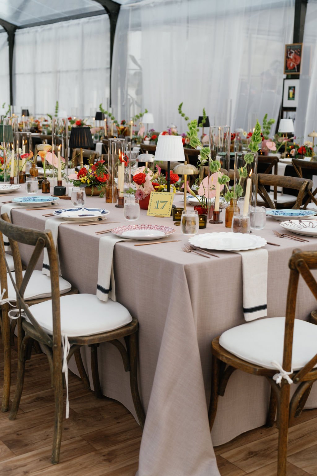 Modern eclectic luxury wedding on the lawn at liberty memorial greenhouse tent wedding outdoor reception fall wedding decor october wedding the cottage rose kansas city wedding florist crossroads centerpieces lamps candles ikebana bud vases