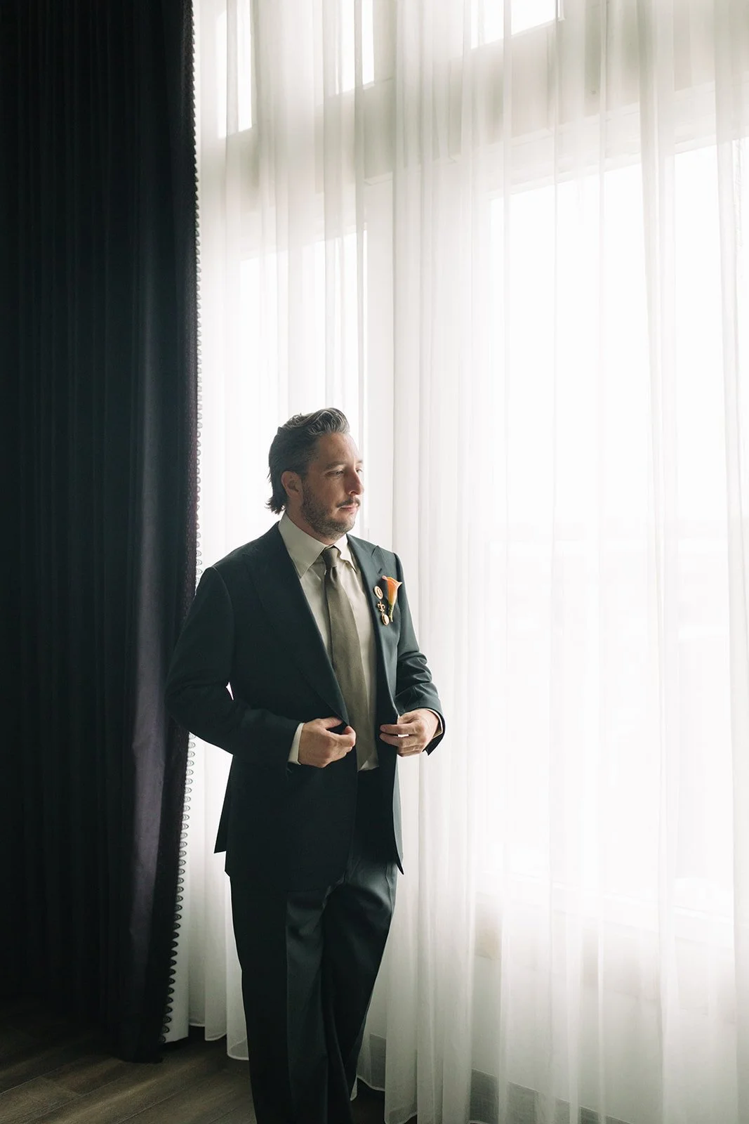 Modern september wedding orange and yellow wedding groom portraits calla lily bout the cottage rose kansas city wedding florist crossroads hotel kansas city wedding