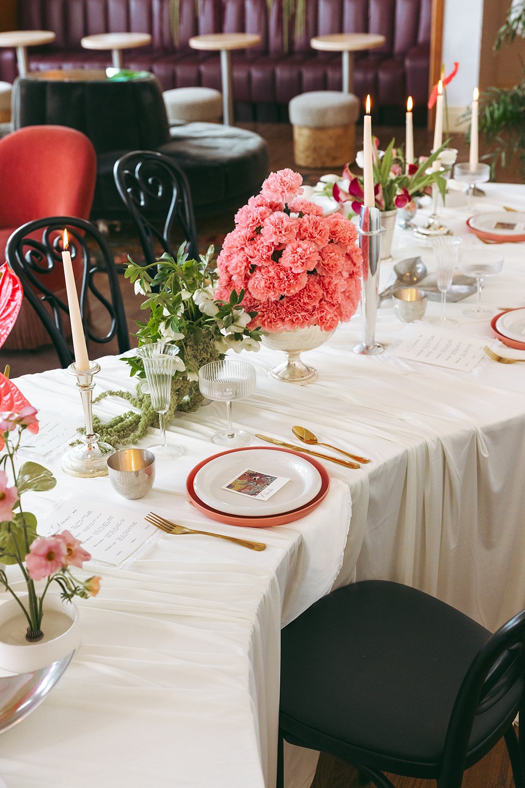 minimal modern feminine whimsical serpentine table centerpiece burgundy and green color palette orchids anthurium amaranth carnation mound the cottage rose kansas city wedding florist crossroads le lounge no vacancy bride kc true love coordination