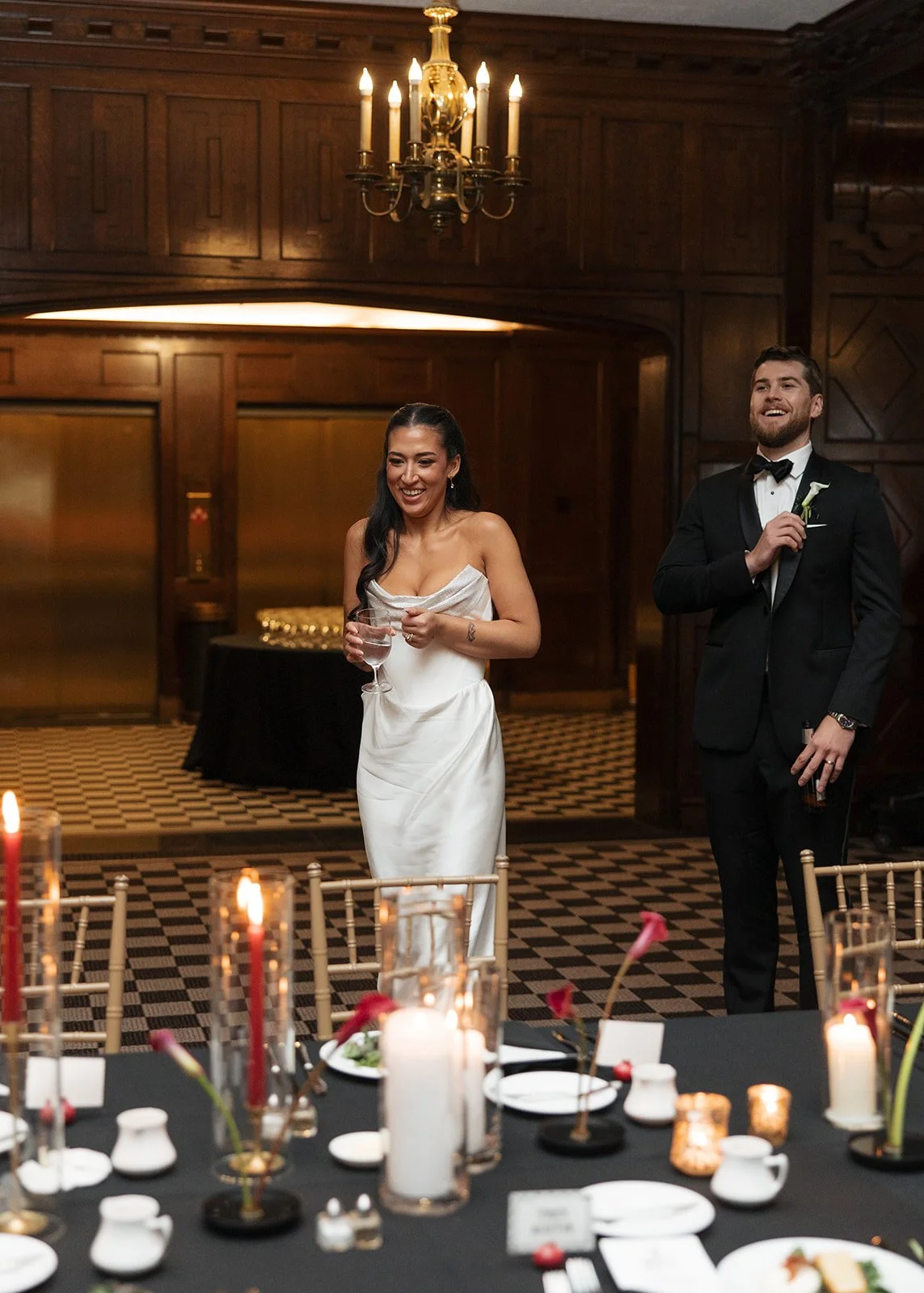 Modern chic november fall wedding downtown hotel kansas city rose petals orchids  wedding bride and groom reception first look head table candles calla lily ikebana arrangement the cottage rose kansas city wedding florist crossroads