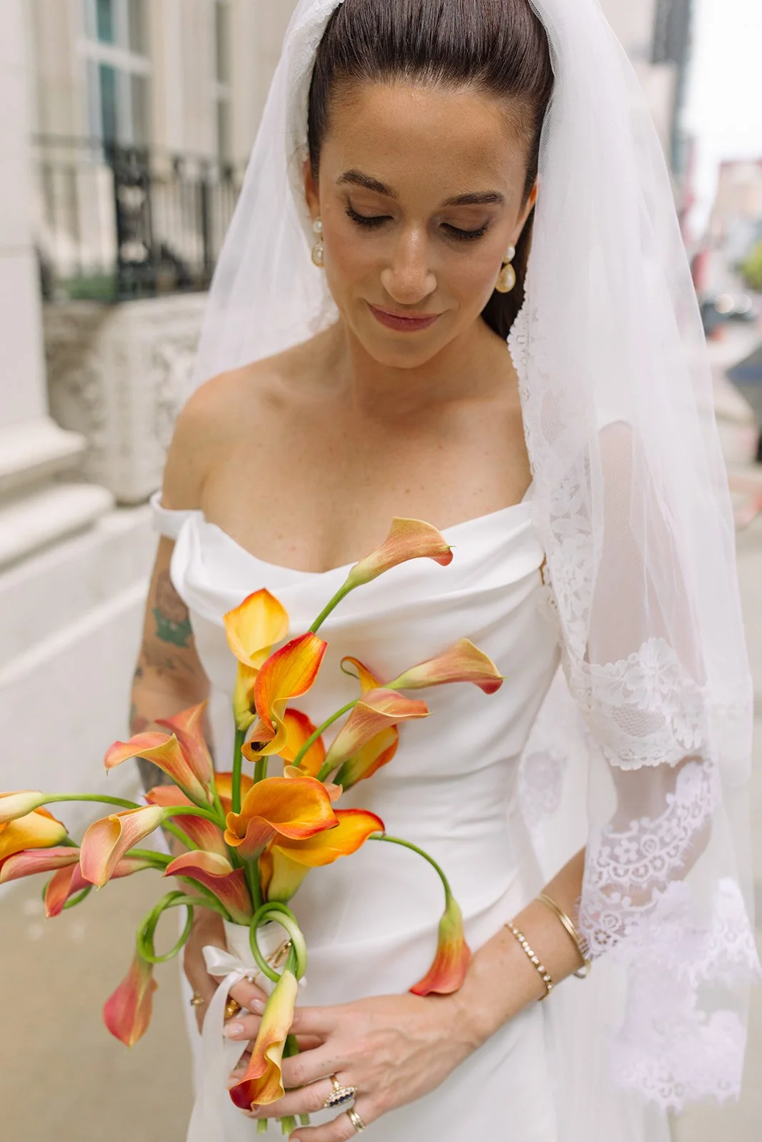 Modern september wedding orange and yellow calla lily bridal bouquet wedding bridal portraits the cottage rose kansas city wedding florist crossroads hotel kansas city wedding