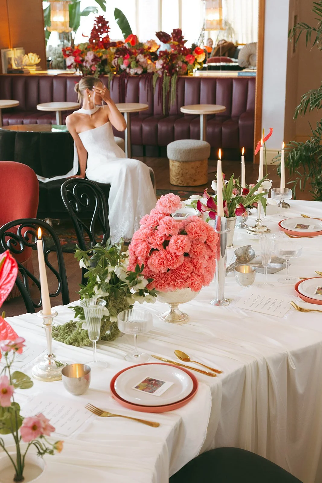 minimal modern feminine whimsical serpentine table centerpiece burgundy and green color palette orchids anthurium amaranth carnation mound the cottage rose kansas city wedding florist crossroads le lounge no vacancy bride kc true love coordination