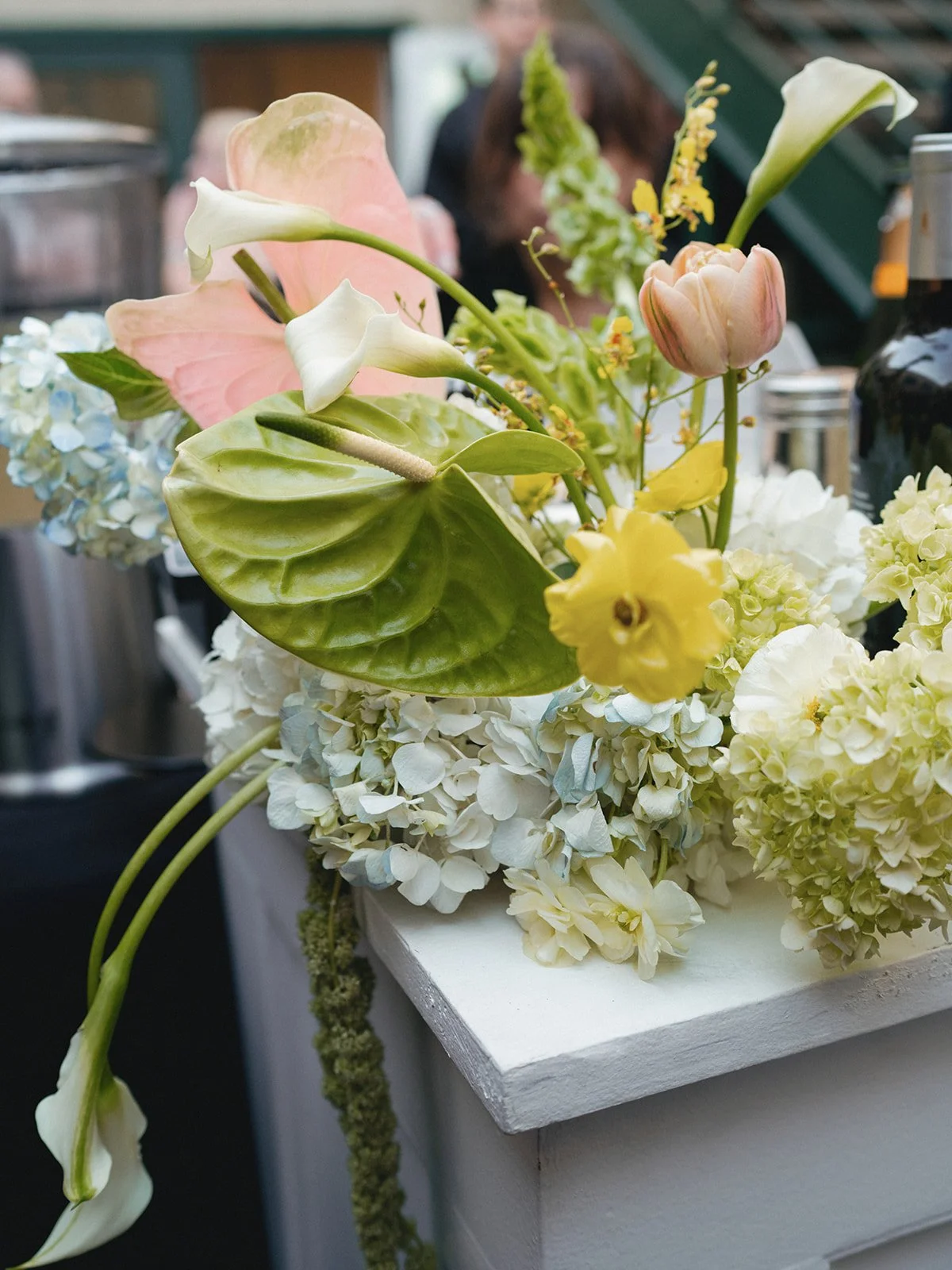 Sculptural modern spring wedding pedestal floral installation anthurium amaranth midtown la villa spring flowers the cottage rose kansas city wedding florist crossroads ceremony decor bar flowers