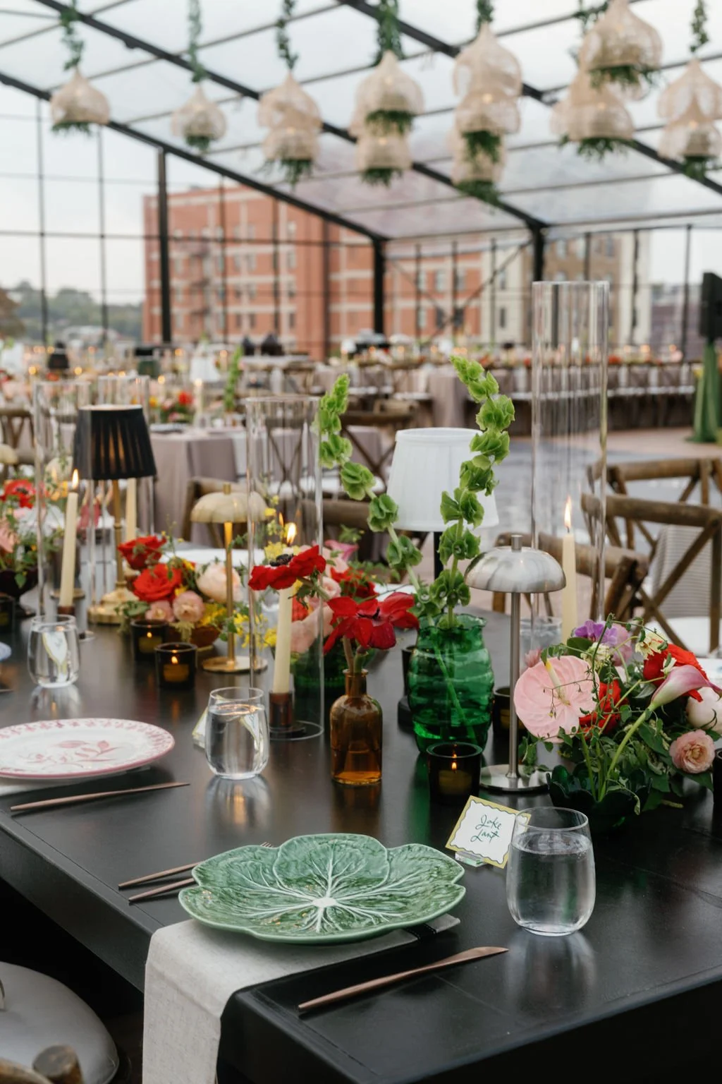 Modern eclectic luxury wedding on the lawn at liberty memorial greenhouse tent wedding outdoor reception fall wedding decor october wedding the cottage rose kansas city wedding florist crossroads centerpieces lamps candles ikebana bud vases