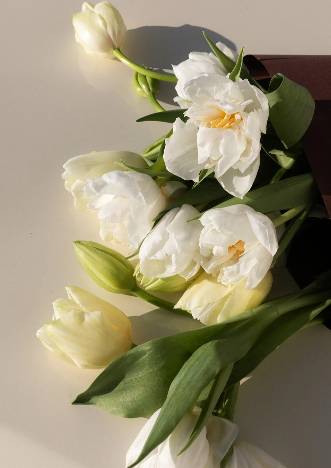 vintage car tulip bouquet wrapped the cottage rose kansas city wedding florist crossroads branding shoot interior designer