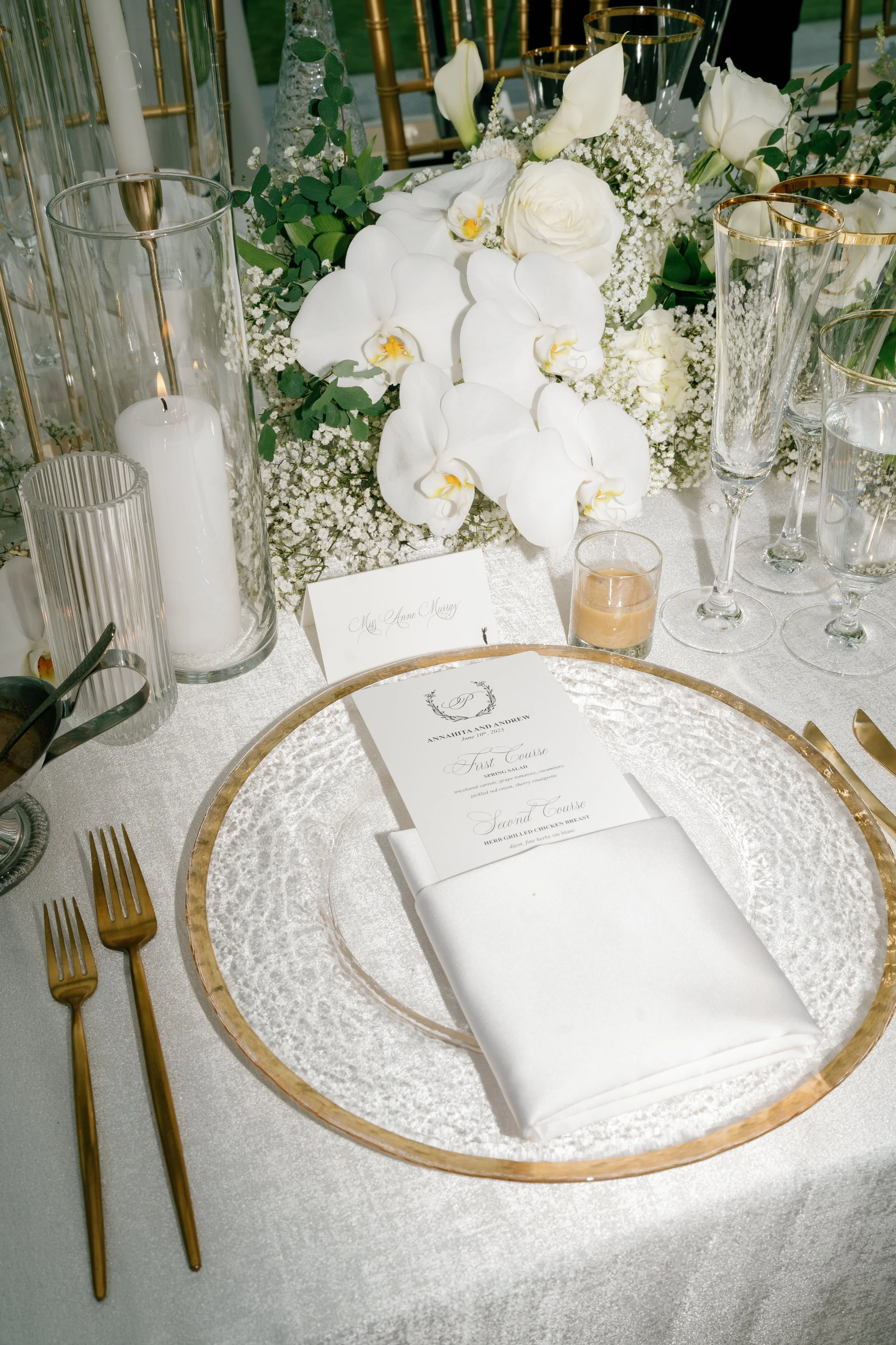 Modern chic spring wedding kauffman center for the performing arts cloud dancer inspiration head table garland tall centerpieces low floral arrangement babys breath orchids calla lilies the cottage rose kansas city wedding florist crossroads