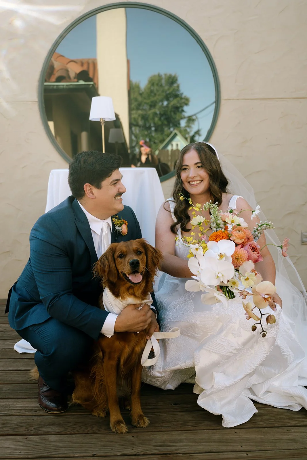 colorful flower filled october wedding in midtown kansas city la villa bride and groom and dog the cottage rose kansas city wedding florist crossroads