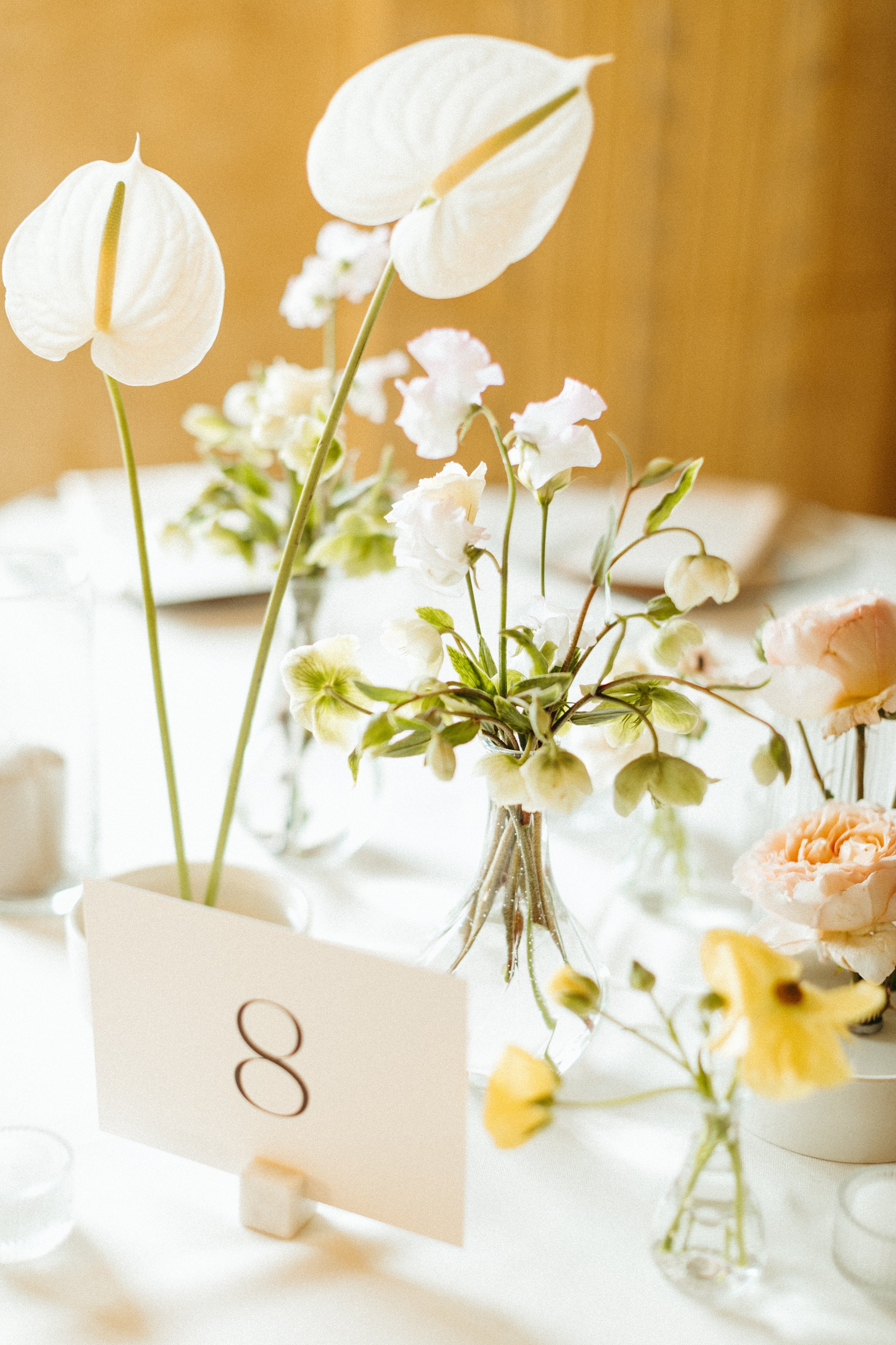 reception flowers centerpieces art deco ballroom venue flowers and candlesmodern garden wedding flowers  the grand hall downtown kc the cottage rose kansas city wedding florist crossroads bud vases ikebana anthurium