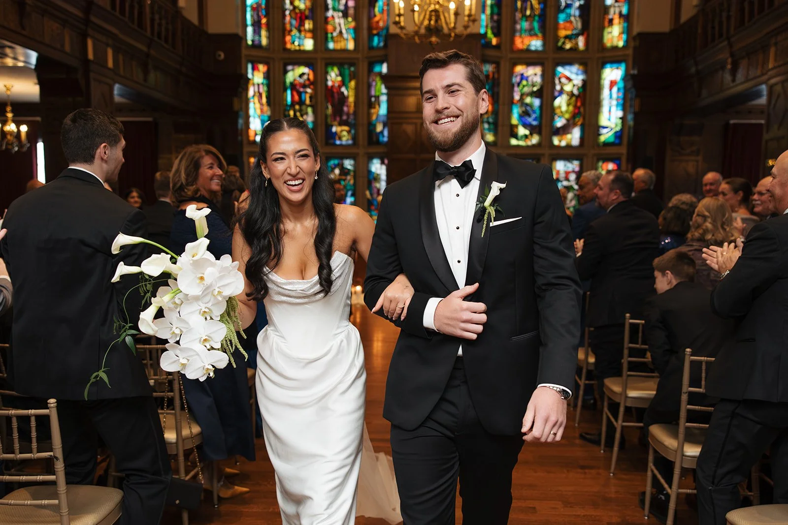 Modern chic november fall wedding downtown hotel kansas city rose petals orchids calla lilies amaranth wedding ceremony bride and groom bridal bouquet the cottage rose kansas city wedding florist crossroads