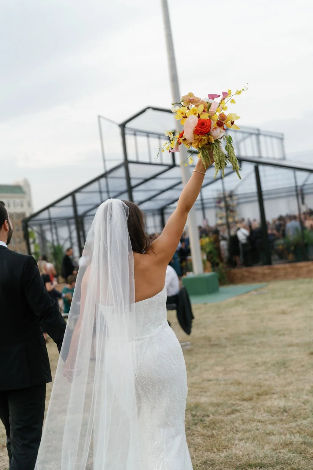 Modern eclectic luxury wedding on the lawn at liberty memorial greenhouse tent wedding outdoor reception fall wedding decor october wedding the cottage rose kansas city wedding florist crossroads bride groom portrait colorful orchid bridal bouquet