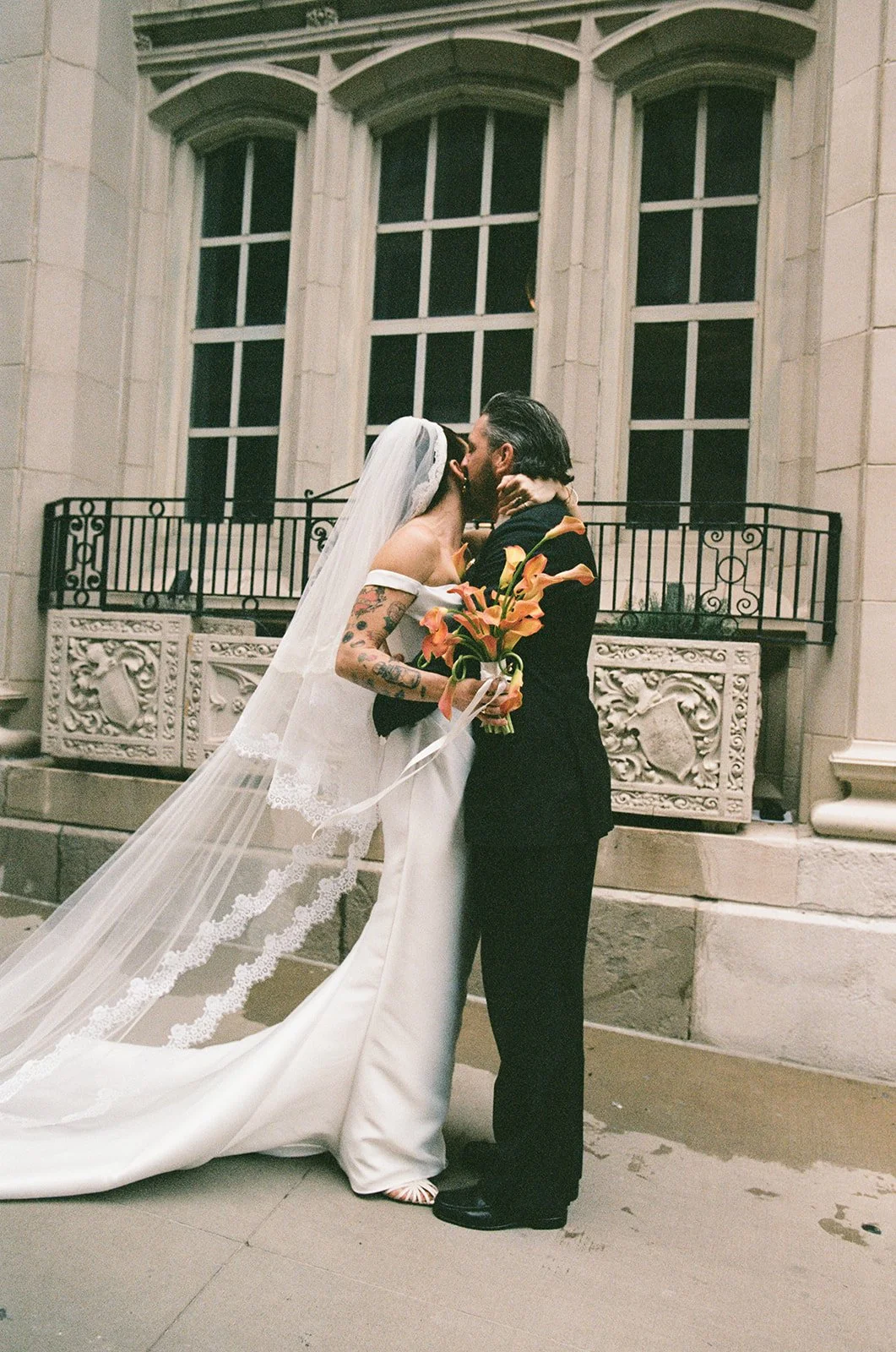 Modern september wedding orange and yellow calla lily bridal bouquet wedding bride and groom first look the cottage rose kansas city wedding florist crossroads hotel kansas city wedding
