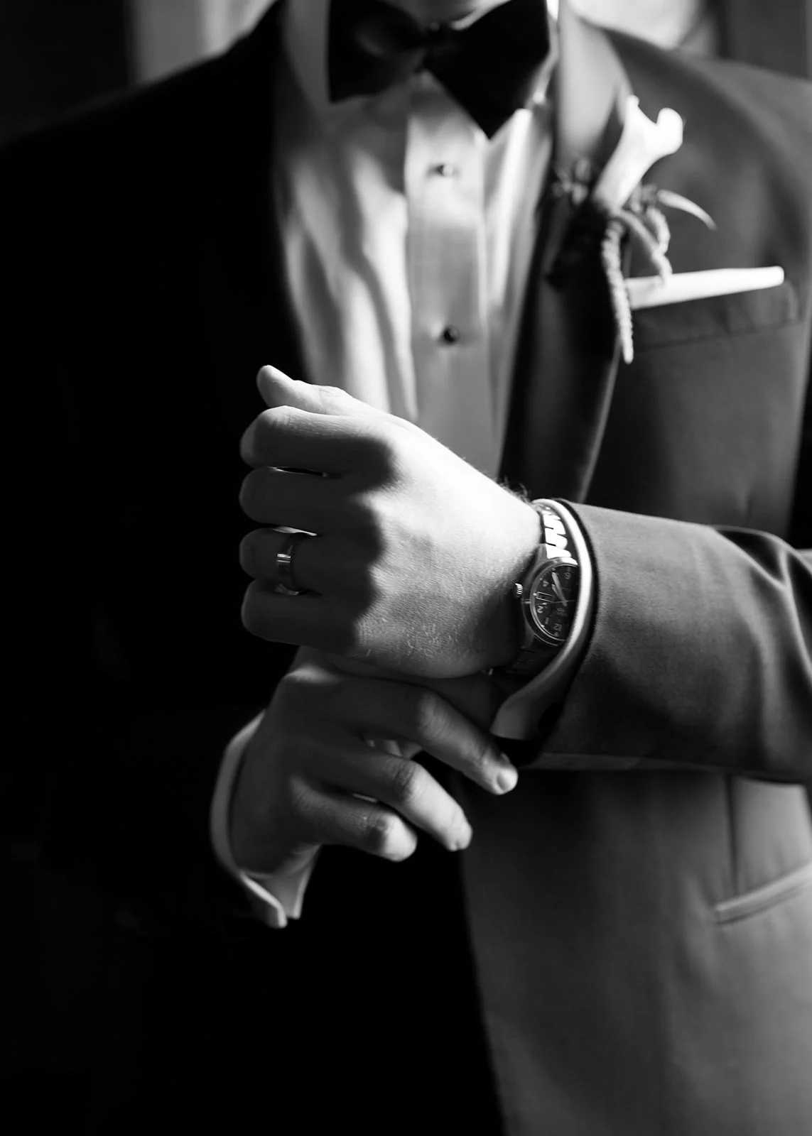 Modern chic november fall wedding downtown hotel kansas city orchids calla lilies amaranth bout anthurium groom portrait chic groom style the cottage rose kansas city wedding florist crossroads