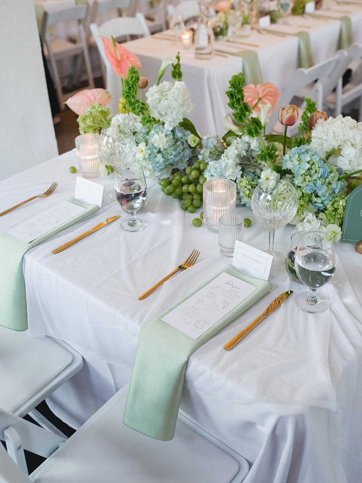 Sculptural modern spring wedding bud vases fruit and flowers candles hanging installation midtown la villa spring flowers the cottage rose kansas city wedding florist crossroads reception decor sweetheart table