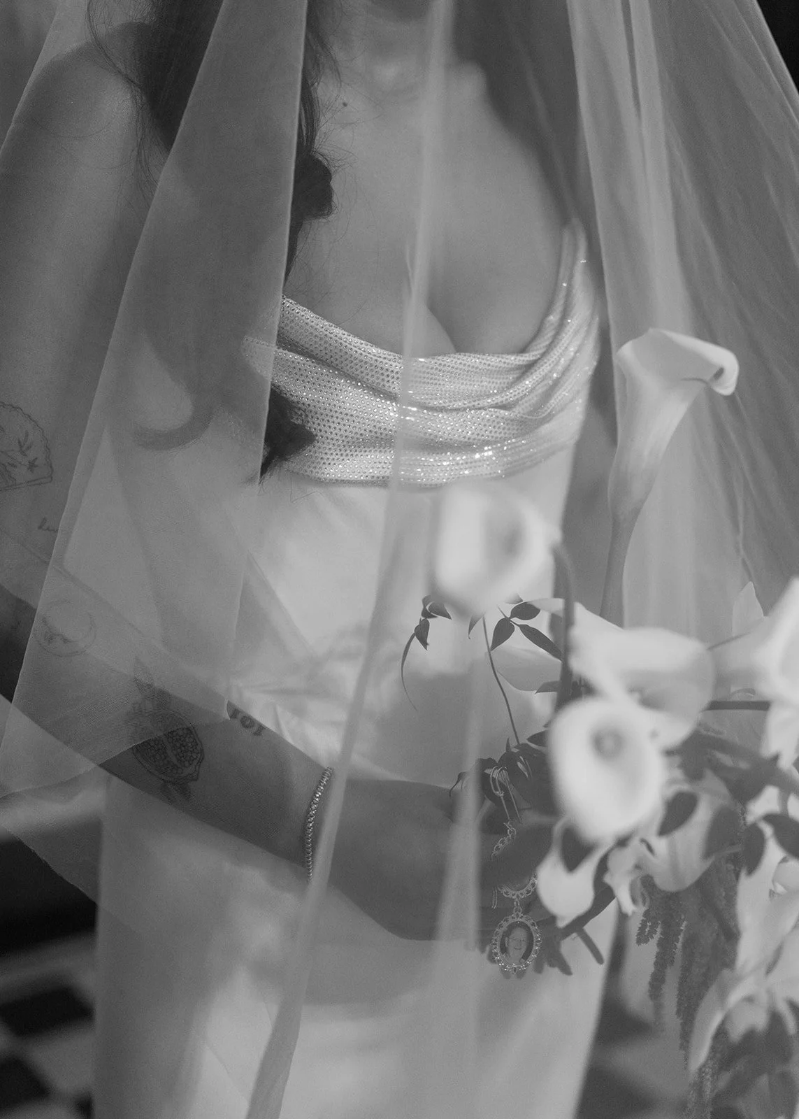 Modern chic november fall wedding downtown hotel kansas city orchids calla lilies amaranth bouquet anthurium bridal portrait chic bridal style the cottage rose kansas city wedding florist crossroads veil