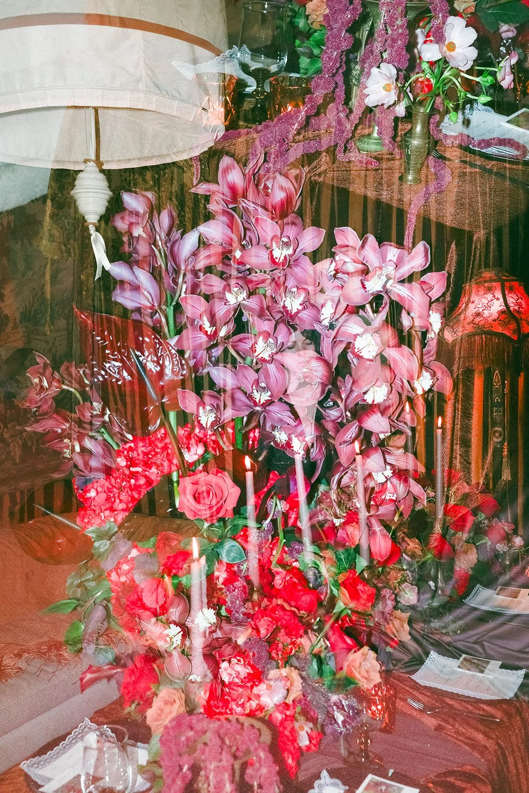 Vintage maximalist more is more wedding inspiration full lush florals pop of red double exposure le lounge kansas city wedding florist the cottage rose crossroads spring wedding decor brown fabric orchids amaranth lace fringe