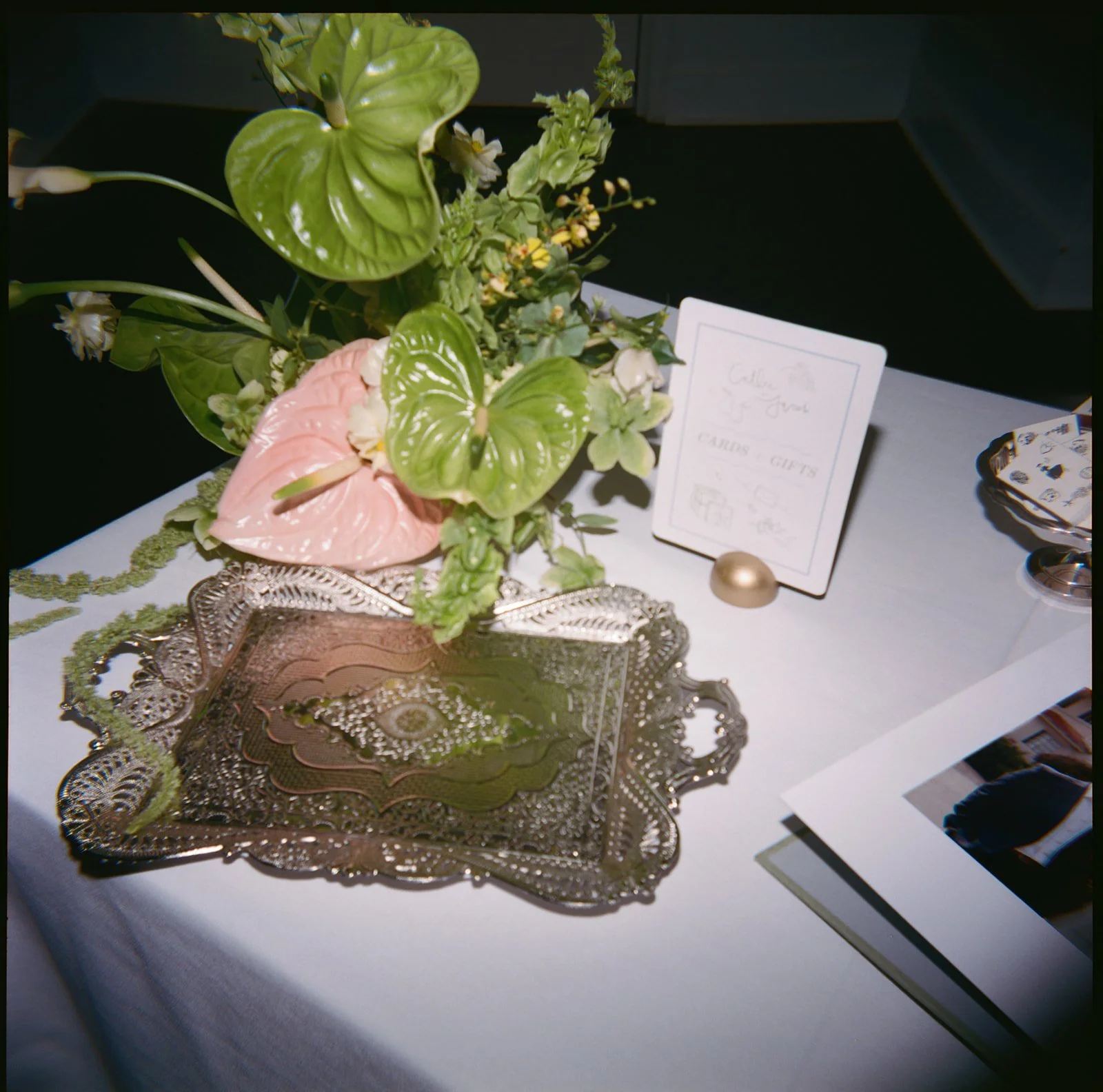 Sculptural modern spring wedding pedestal floral installation anthurium amaranth midtown la villa spring flowers the cottage rose kansas city wedding florist crossroads ceremony decor welcome arrangement