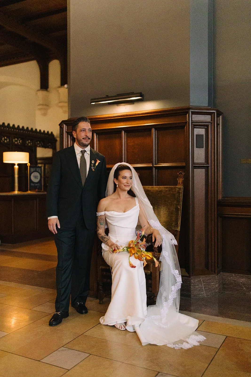 Modern september wedding orange and yellow calla lily bridal bouquet wedding bride and groom first look the cottage rose kansas city wedding florist crossroads hotel kansas city wedding