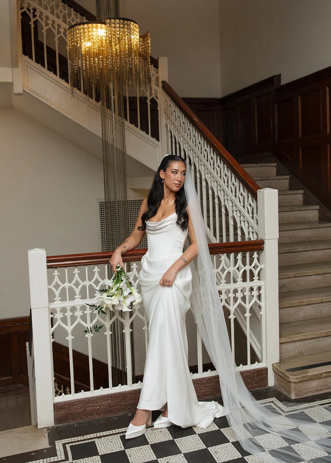 Modern chic november fall wedding downtown hotel kansas city orchids calla lilies amaranth bouquet anthurium bridal portrait chic bridal style the cottage rose kansas city wedding florist crossroads