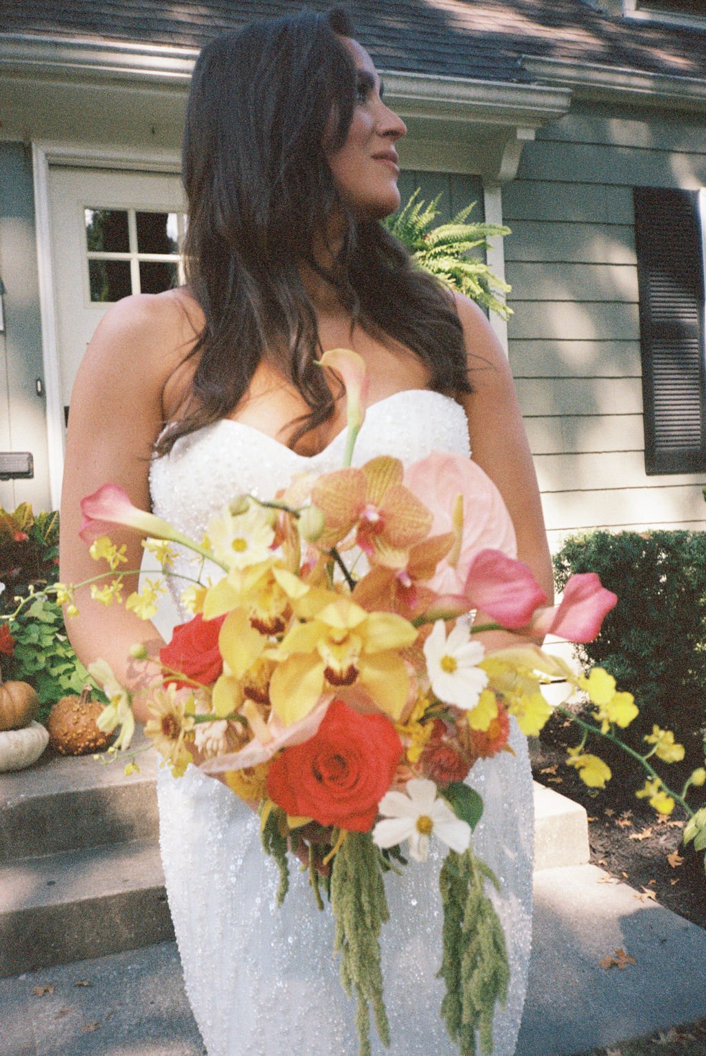 Modern eclectic luxury wedding on the lawn at liberty memorial greenhouse tent wedding outdoor reception fall wedding decor october the cottage rose kansas city wedding florist crossroads bridal portrait colorful orchid bridal bouquet anthurim callas