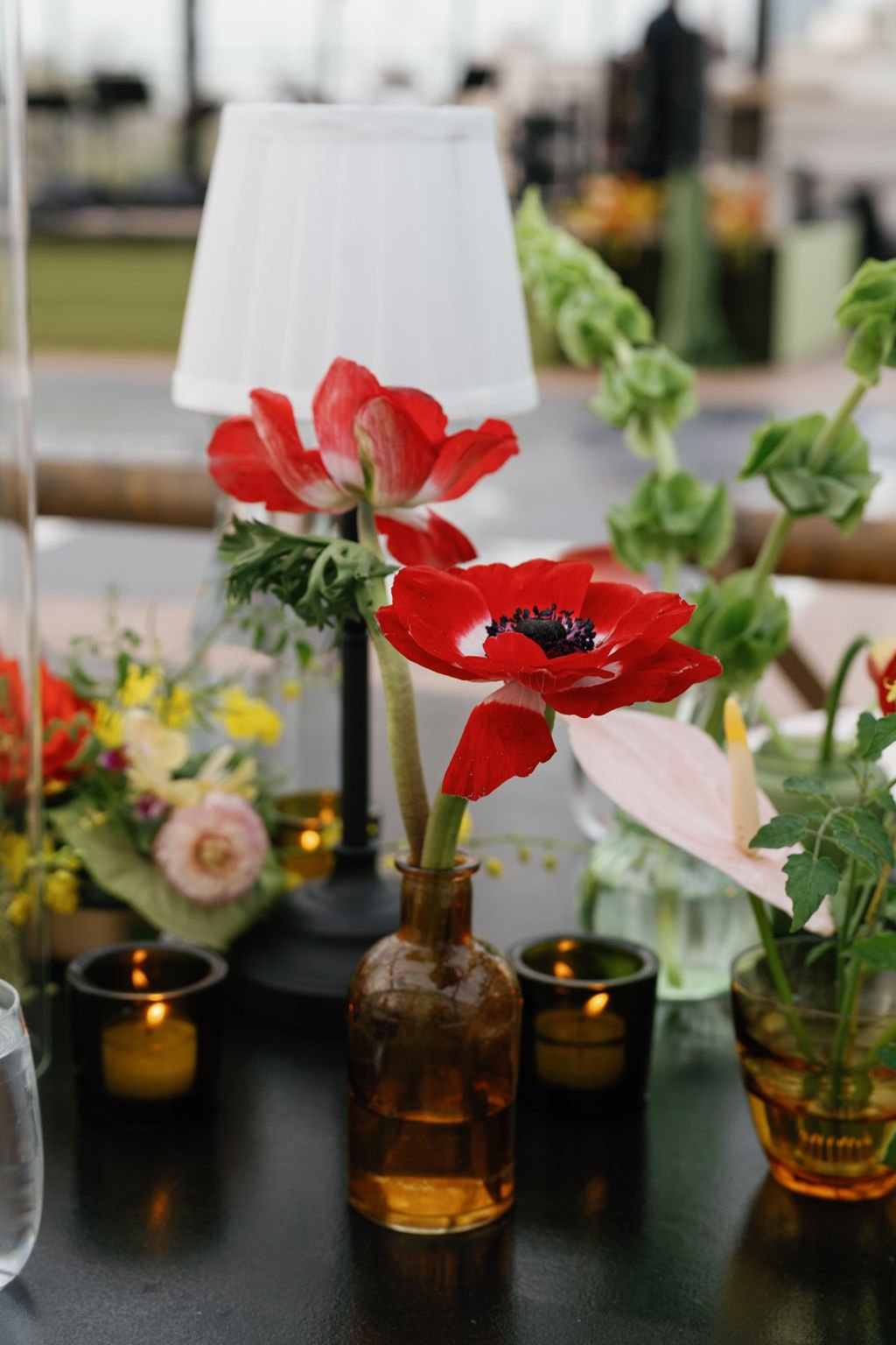 Modern eclectic luxury wedding on the lawn at liberty memorial greenhouse tent wedding outdoor reception fall wedding decor october wedding the cottage rose kansas city wedding florist crossroads centerpieces lamps candles ikebana bud vases