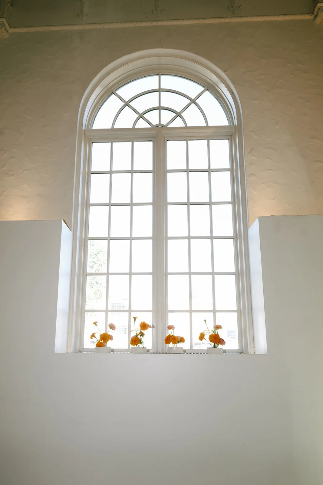 colorful flower filled october wedding in midtown kansas city la villa bridal bouquet wedding bouquet wedding flowers orchids garden roses ranunculus the cottage rose kansas city wedding florist crossroads ikebana marigold flower arrangement