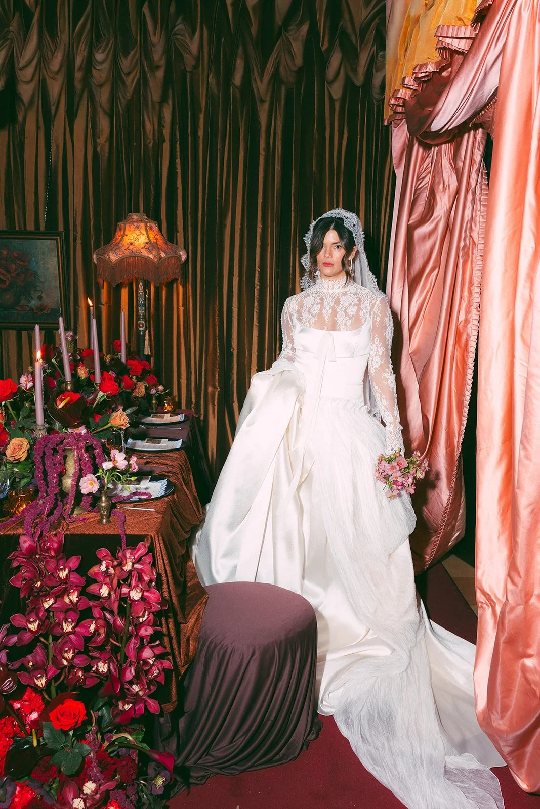 Vintage maximalist more is more wedding inspiration full lush florals pop of red modern victorian lace bridal look le lounge kansas city wedding florist the cottage rose crossroads spring wedding decor brown fabric orchids amaranth bride kc