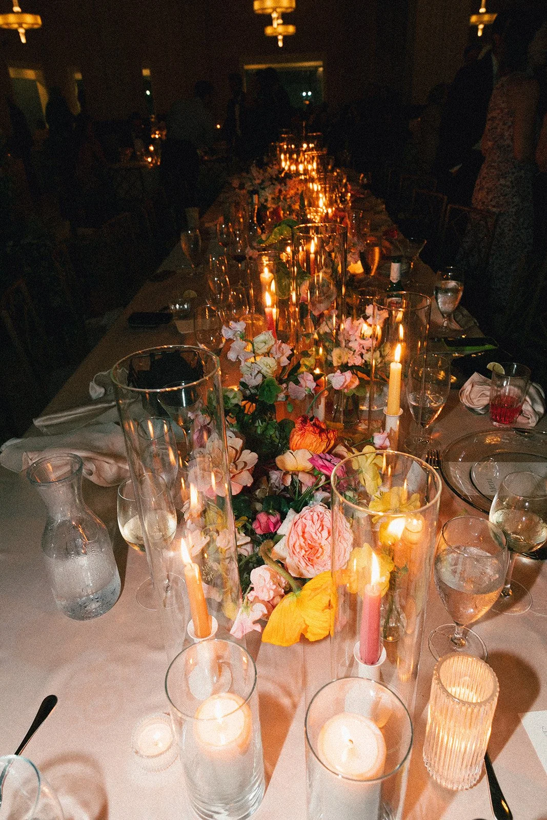 reception flowers large lush floral arch ceremony backdrop head table flowers and candlesmodern garden wedding flowers  the grand hall downtown kc the cottage rose kansas city wedding florist crossroads flash photo