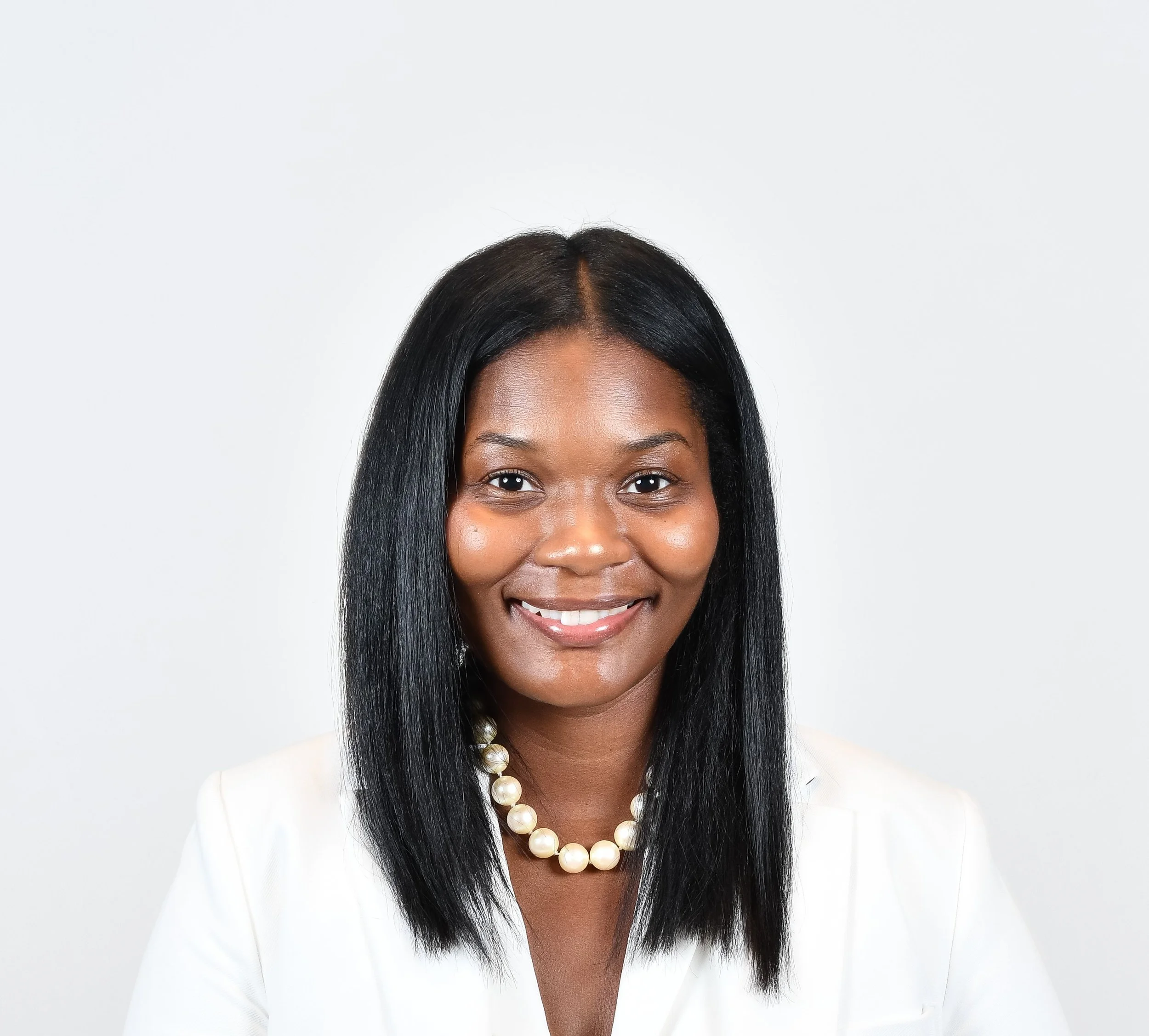 Headshot-White Cropped.jpg