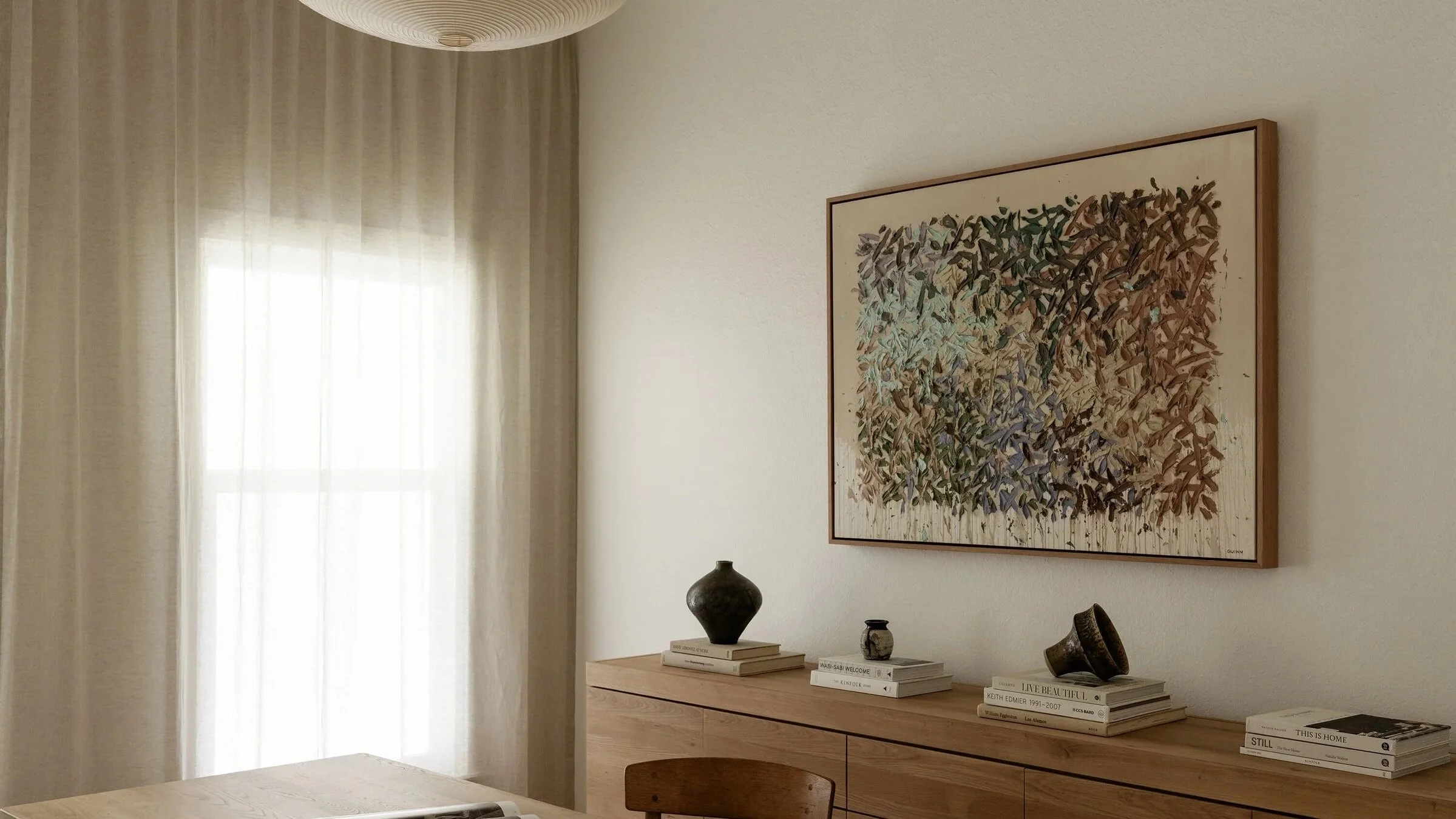 home-office-austin-design-tyler-guinn-painting-oak-cabinet-desk-noguchi-drapery-natural-light-austin-house-franc.jpg
